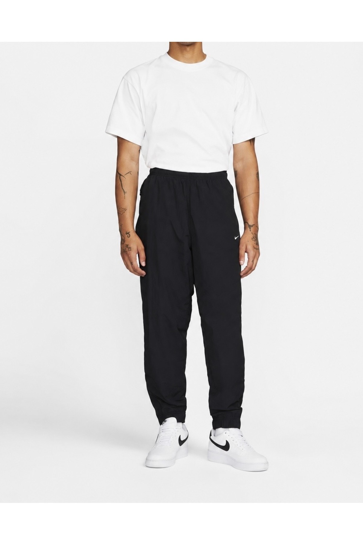 شلوار ورزشی پارچه‌ای مردانه Solo Swoosh طرح چتر نجات نایکی شلوار ورزشی Nike