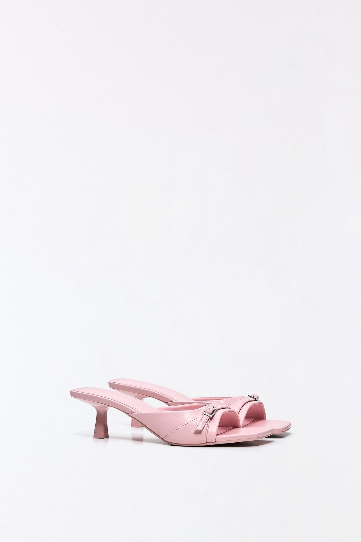 Buckle heeled open-back shoes