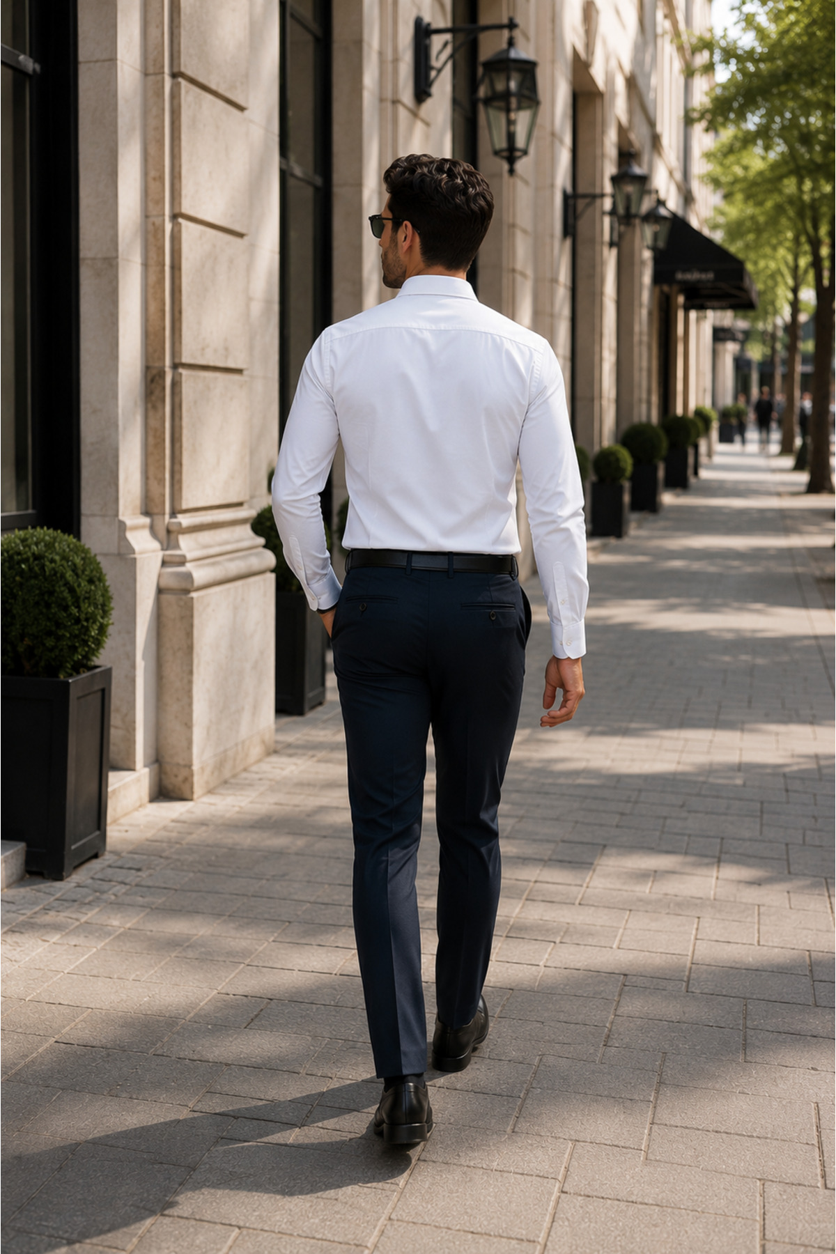 White slim-fit shirt for men with classic collar and long sleeves, suitable for suits and groom outfits