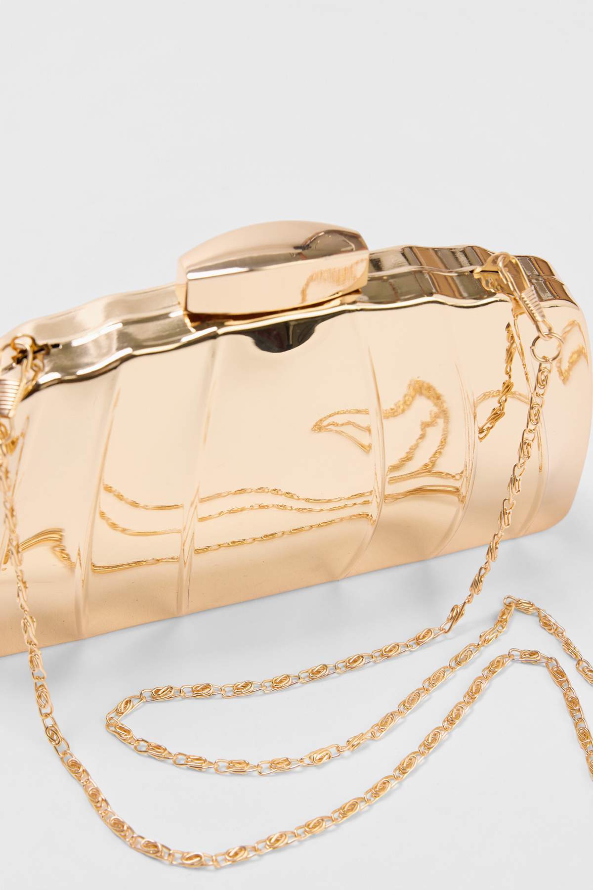 trendyol-shoes-womens-gold-colored-clutch-bag