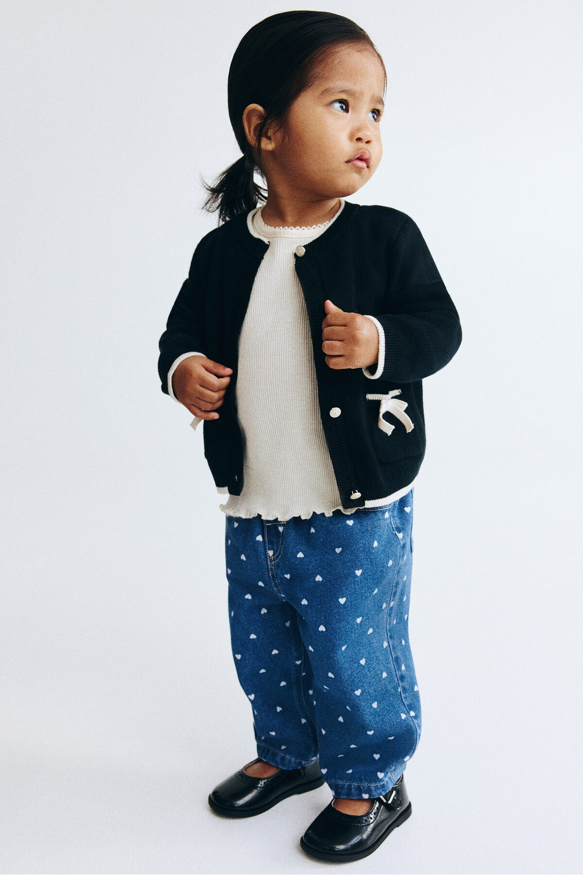 شلوار جین کمردار چاپی و کاغذی اچ اند ام شلوار جین H&M