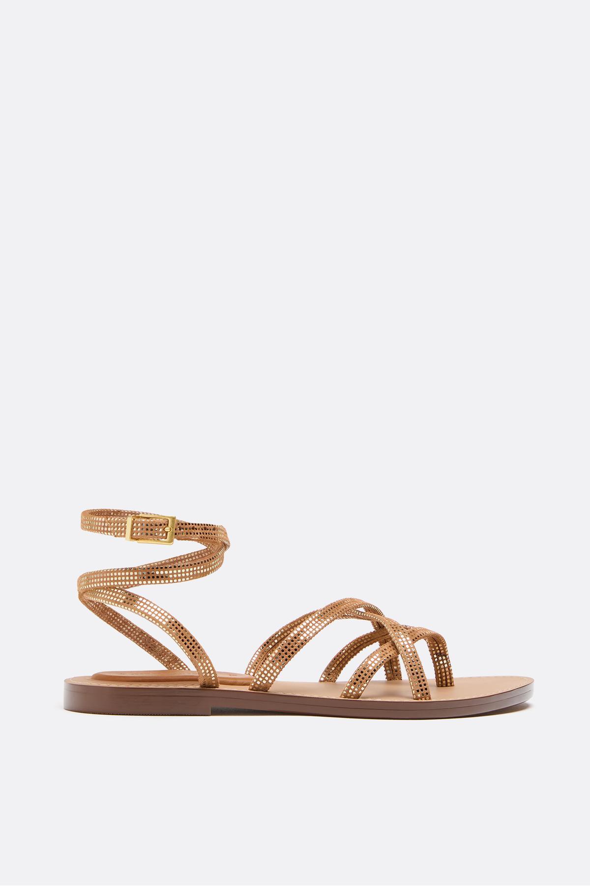 Leather sandals with staples