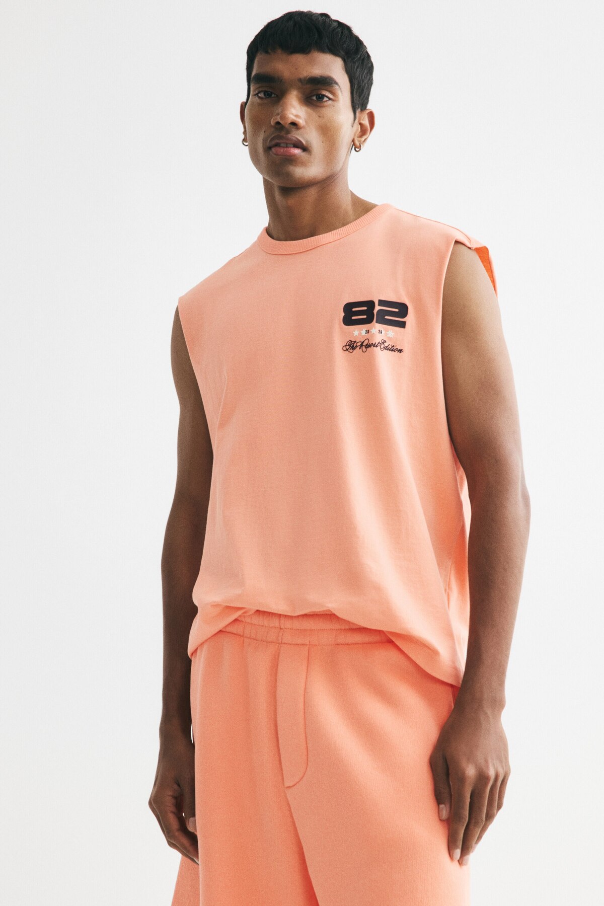 تاپ گشاد بدون آستین طرح‌دار اچ اند ام تی شرت H&M