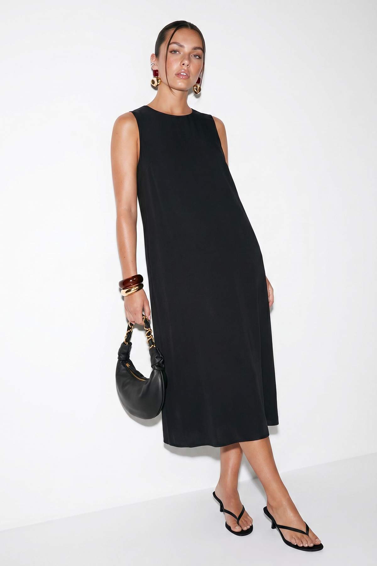 Drop by Trendyolmilla Siyah Bisiklet Yaka Kolsuz Dokuma Elbise TDRSS26EL00079