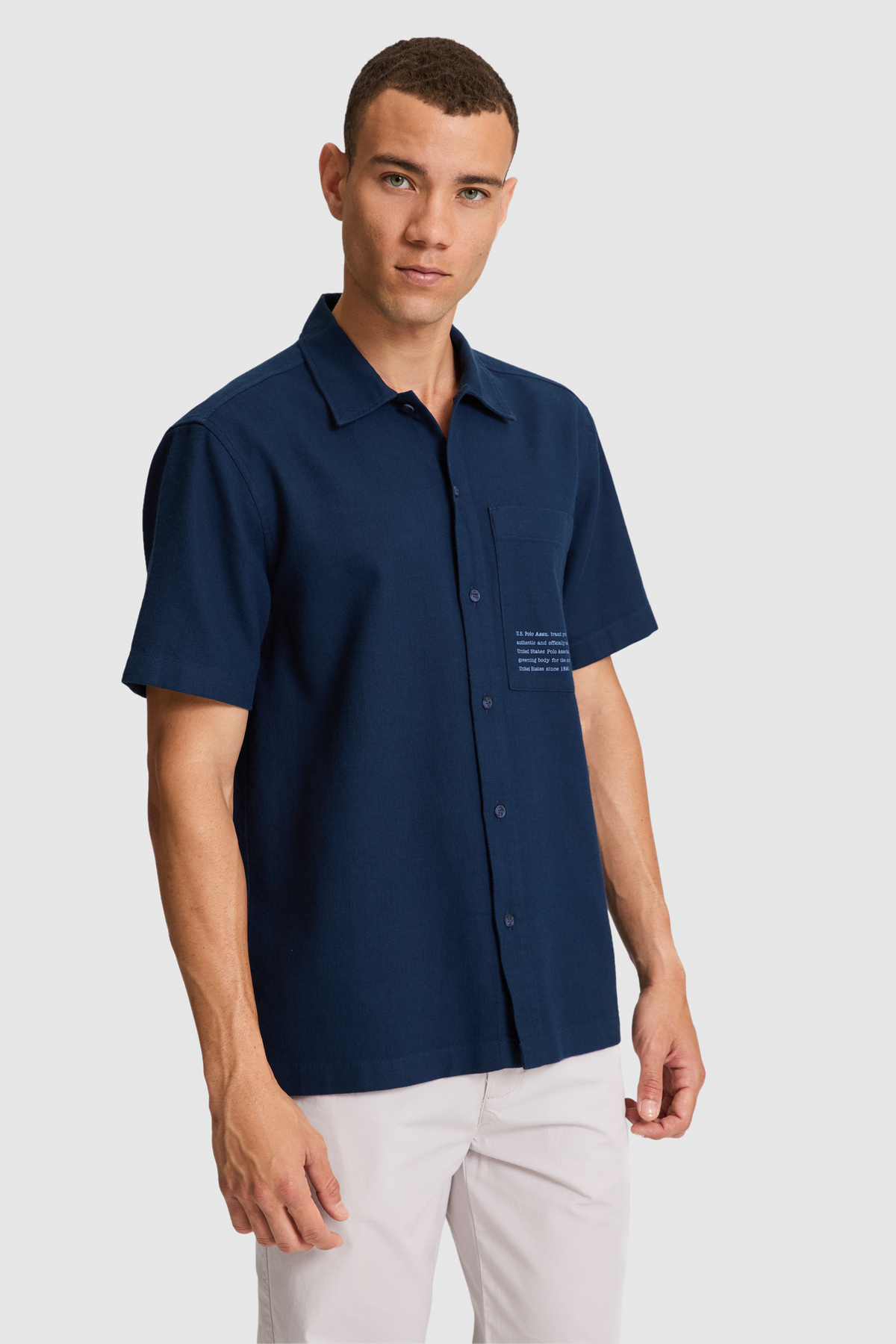 یو اس پولو پیراهن آستین کوتاه مردانه سرمه‌ای کد ۵۰۳۲۴۷۳۹-VR033