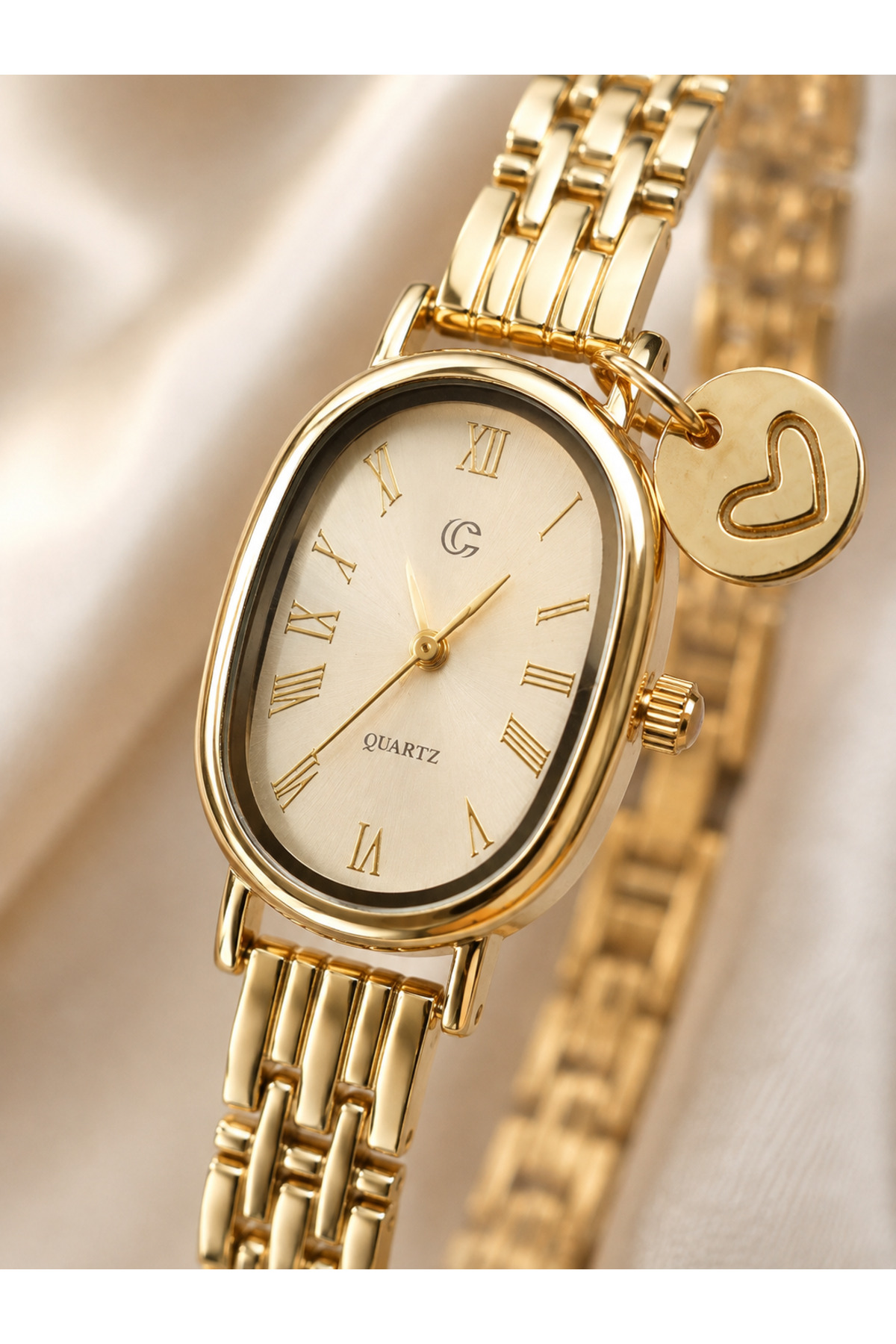 Coliseum Yeni Sezon Kadın Gold Oval Kasa Kol Saati, Roma Rakamlı Kadran, Kalp Charm Detaylı Zarif Metal Kordon Quartz Saat görsel 3