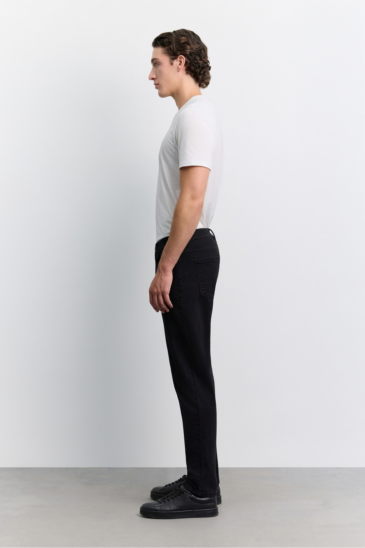 شلوار جین مردانه مشکی کهنه‌شده و شسته شده با الیاف پنبه و الاستین مدل Madrid Comfort Slim Fit A62Y3528