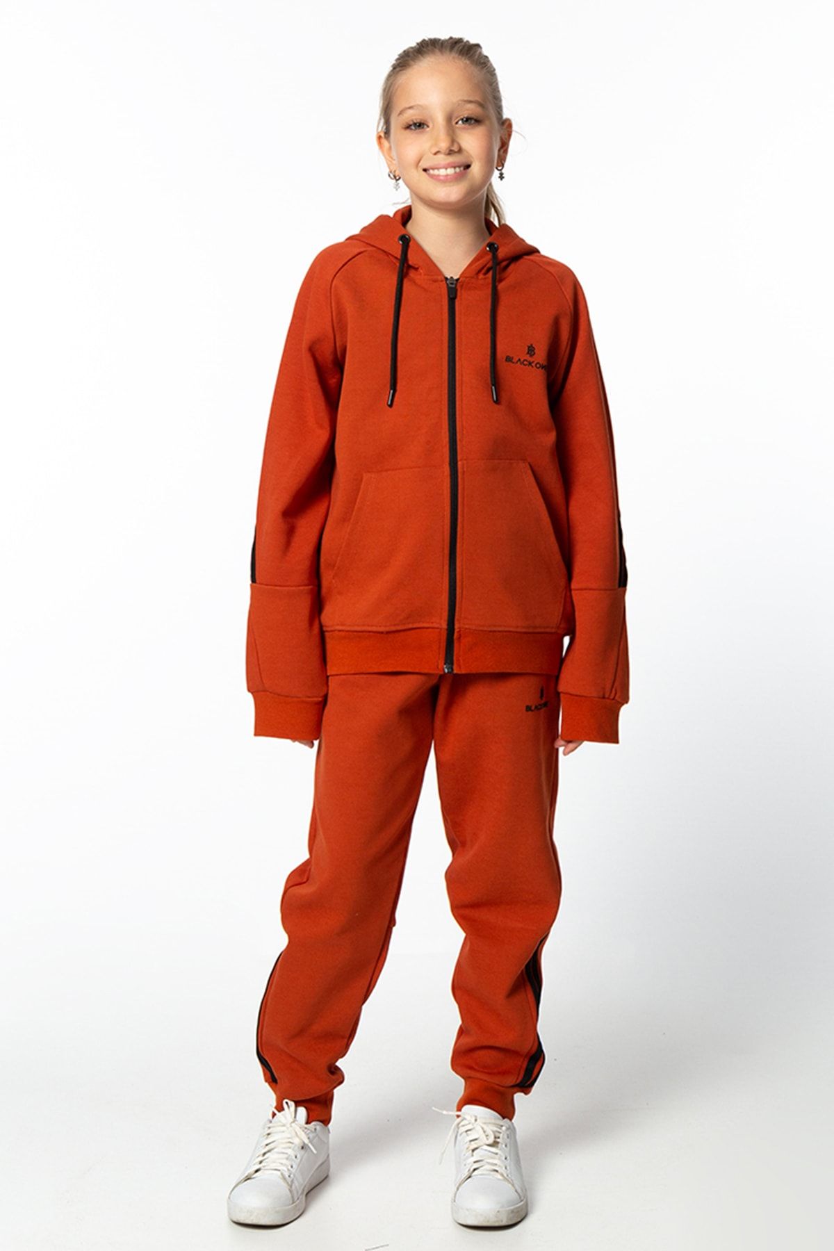 Orange and black sweatsuit 2025