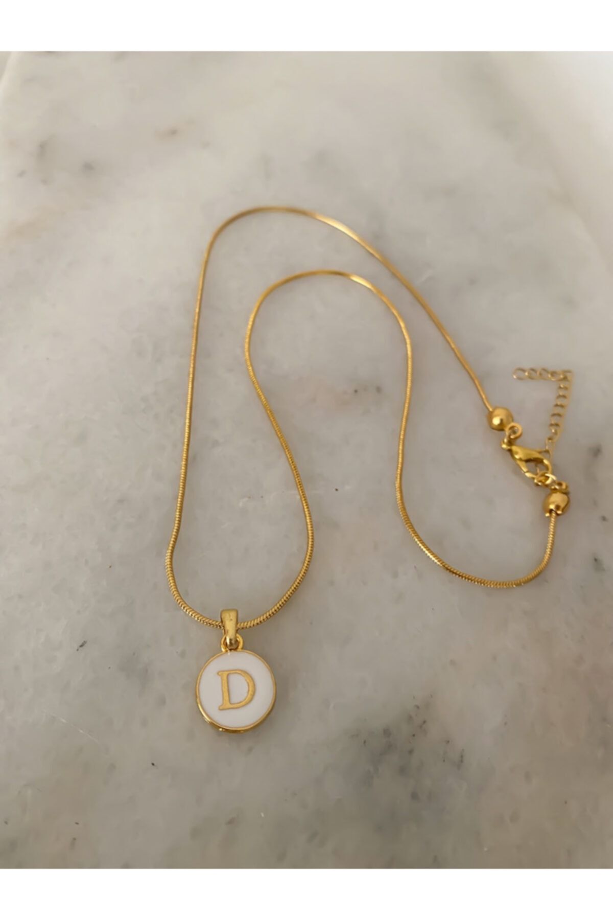 D shop pendant gold
