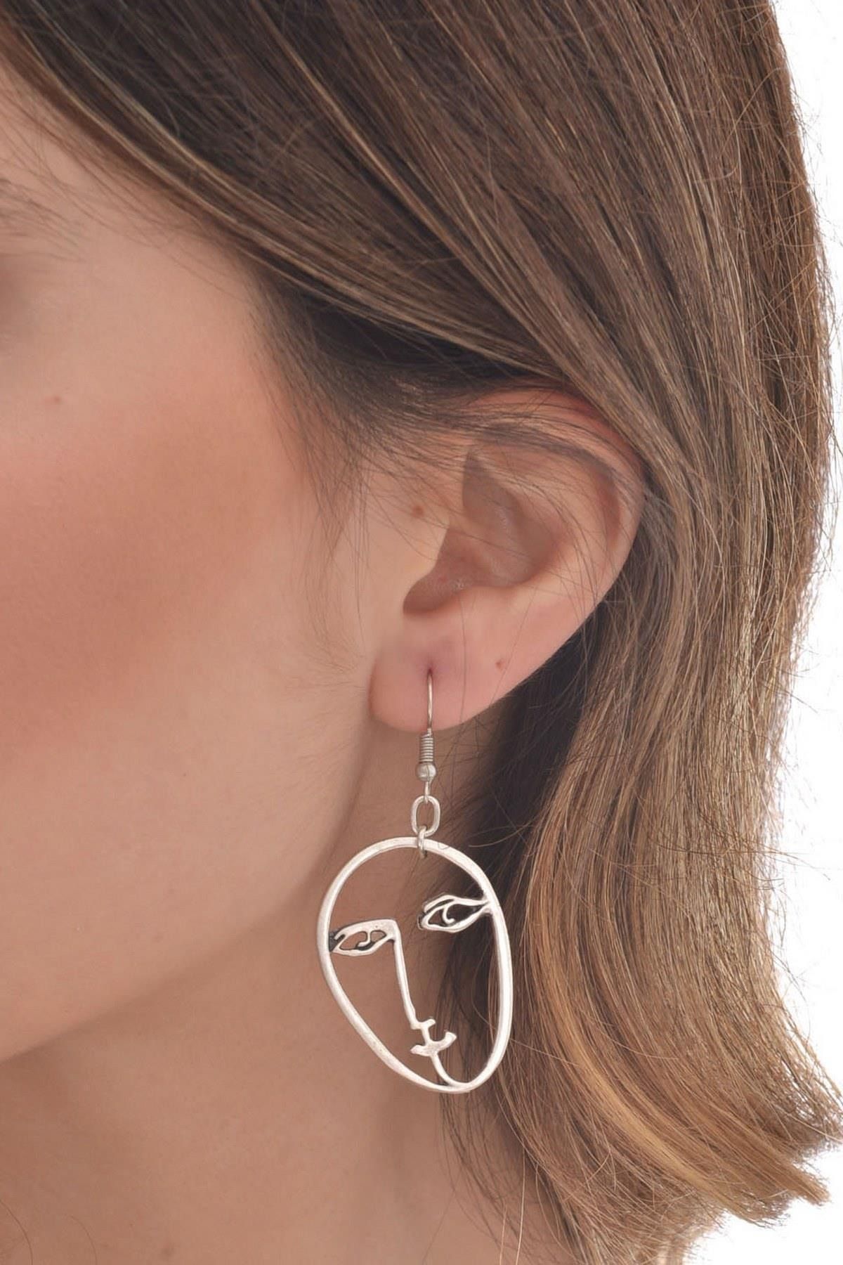 Face earrings deals