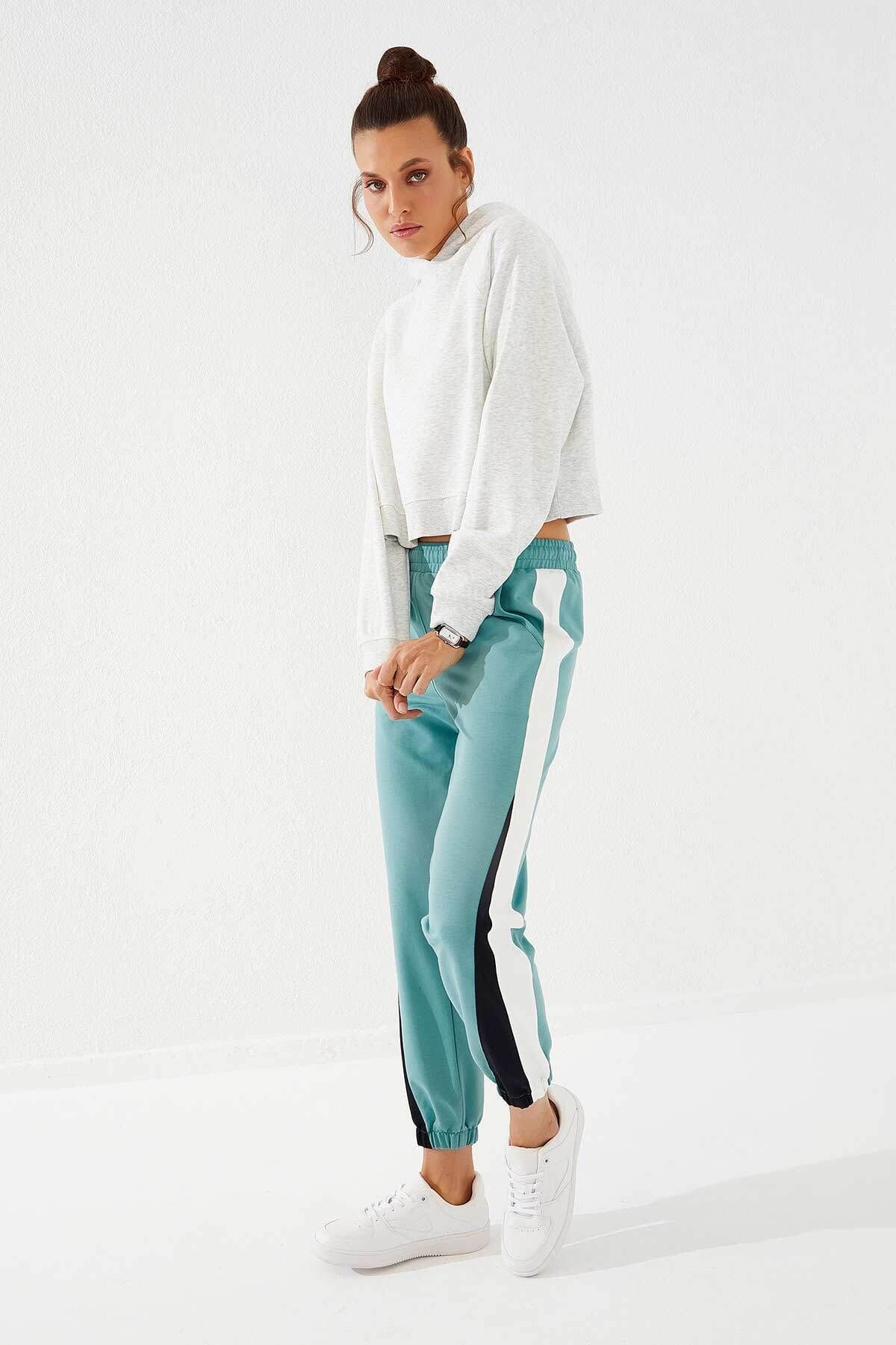 Two color track pants top
