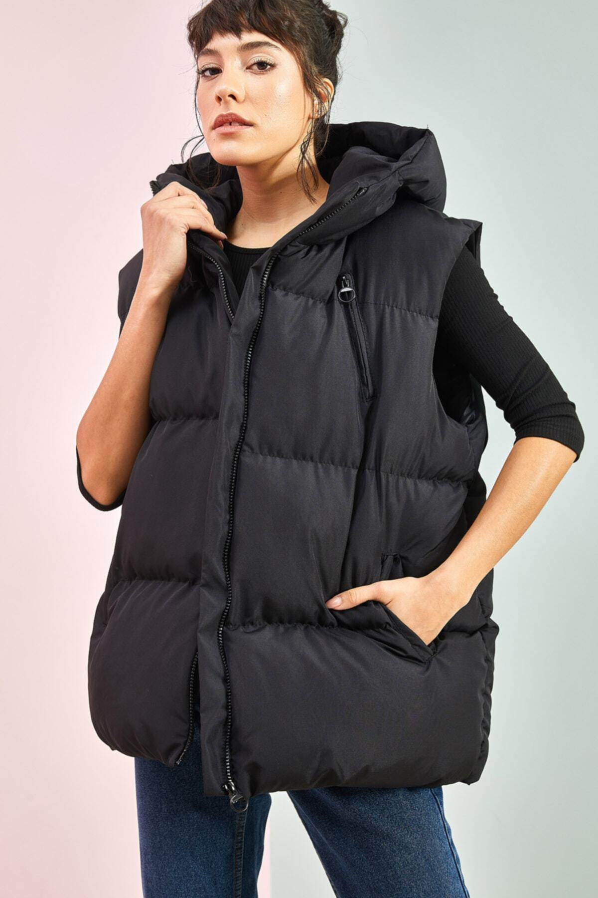 Bianco Lucci-Oversize-Pufferweste für Damen mit Kapuze und Taschen 4