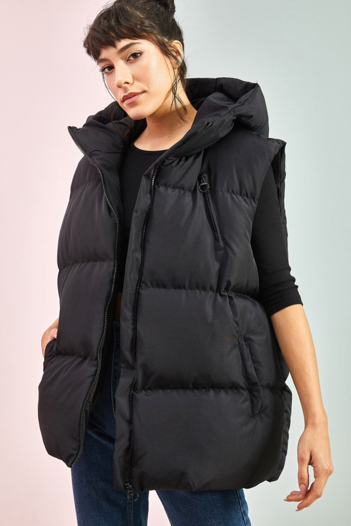 Bianco Lucci-Oversize-Pufferweste für Damen mit Kapuze und Taschen 3