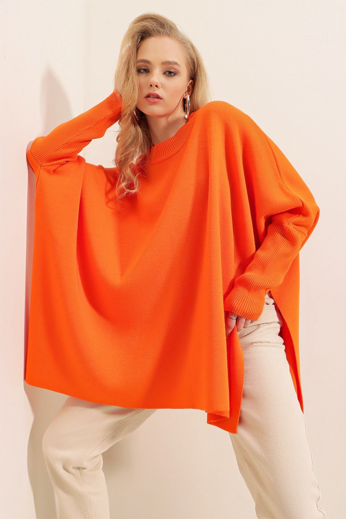 Orange best sale poncho sweater
