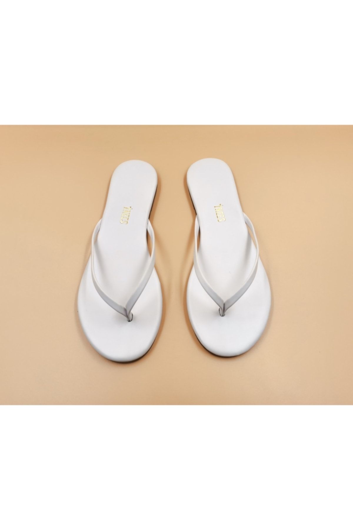 Tkees white flip flops new arrivals