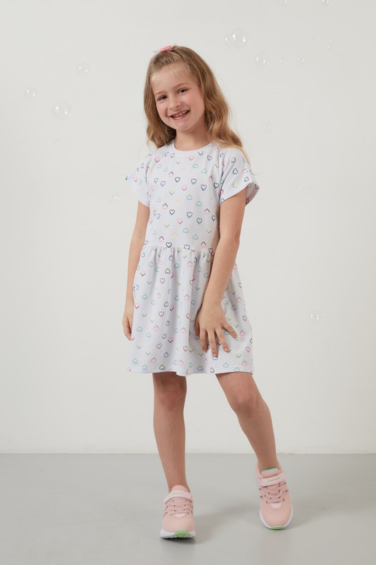 للا لباس دخترانه آستین کوتاه طرح‌دار نخی