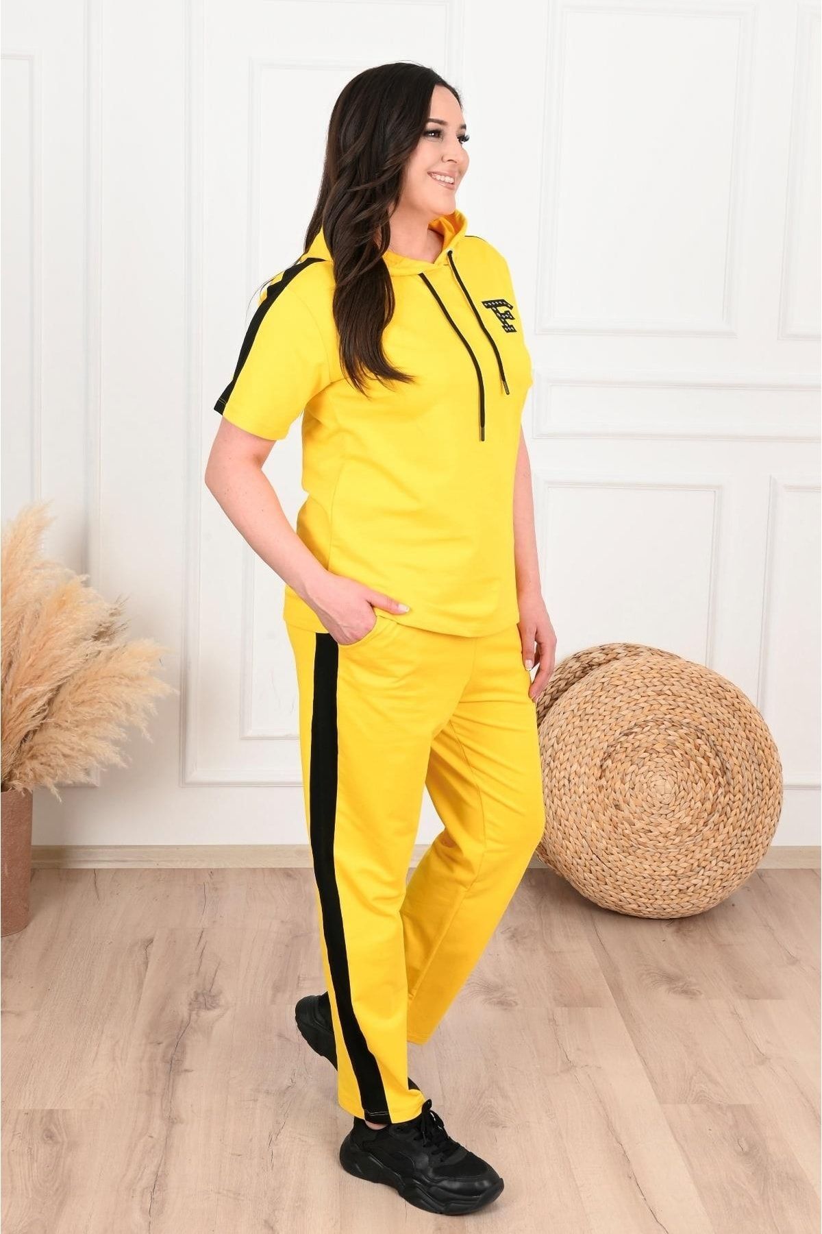 Yellow sweat suit 2025