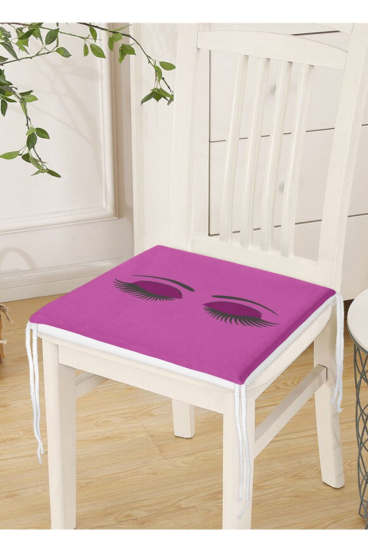 Realhomes-Zippered Chair Cushion with Eyelash Motif on Purple Floor 4
