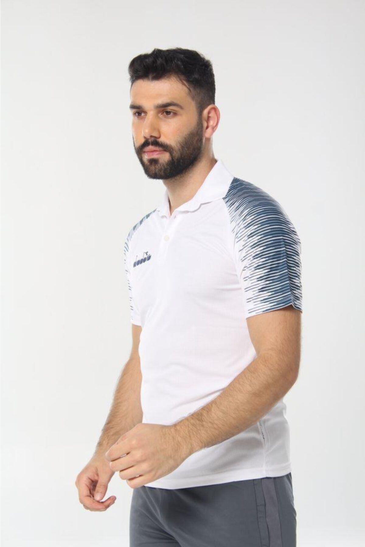تی شرت ورزشی سفید مردانه و زنانه چوگان ریتم Diadora
