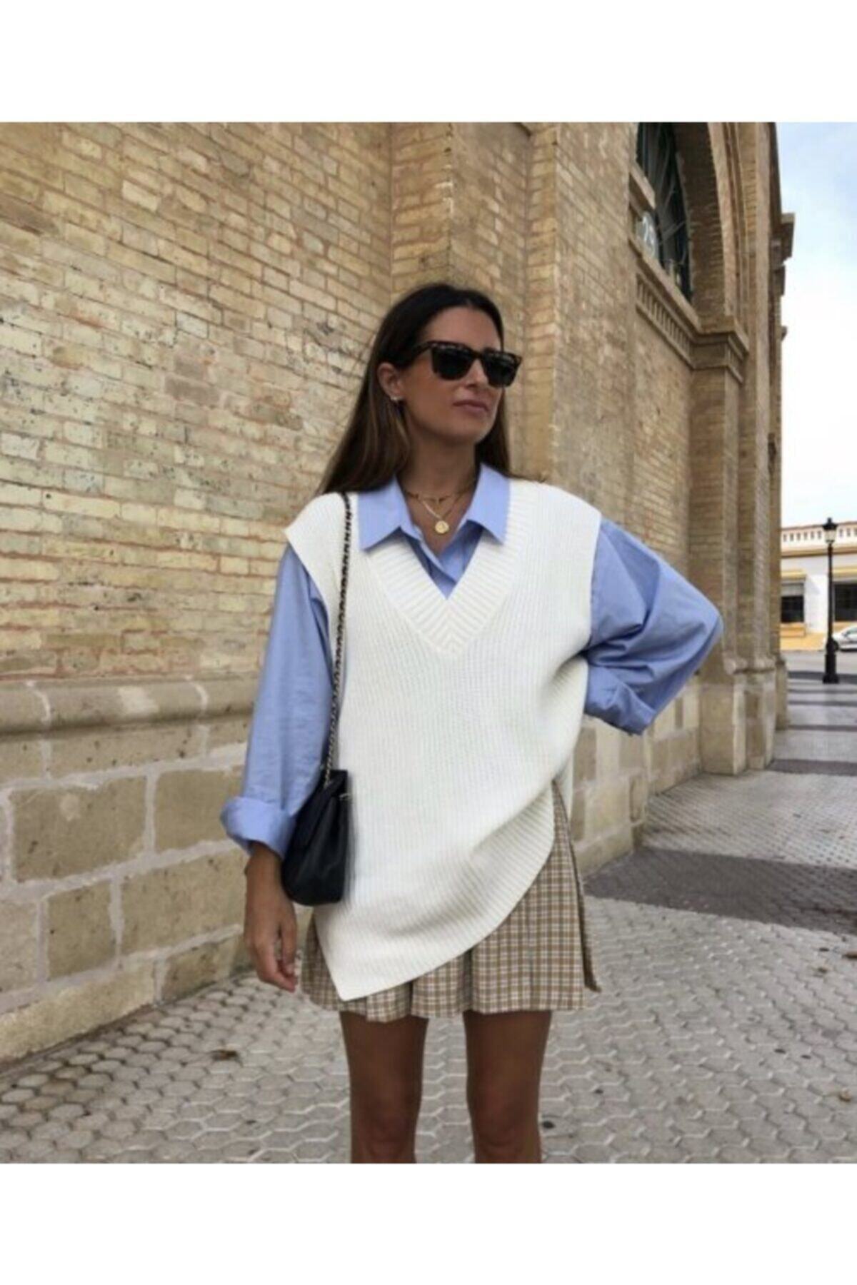 tarzınensa Damski sweter w kolorze ecru z dekoltem w kształcie litery V