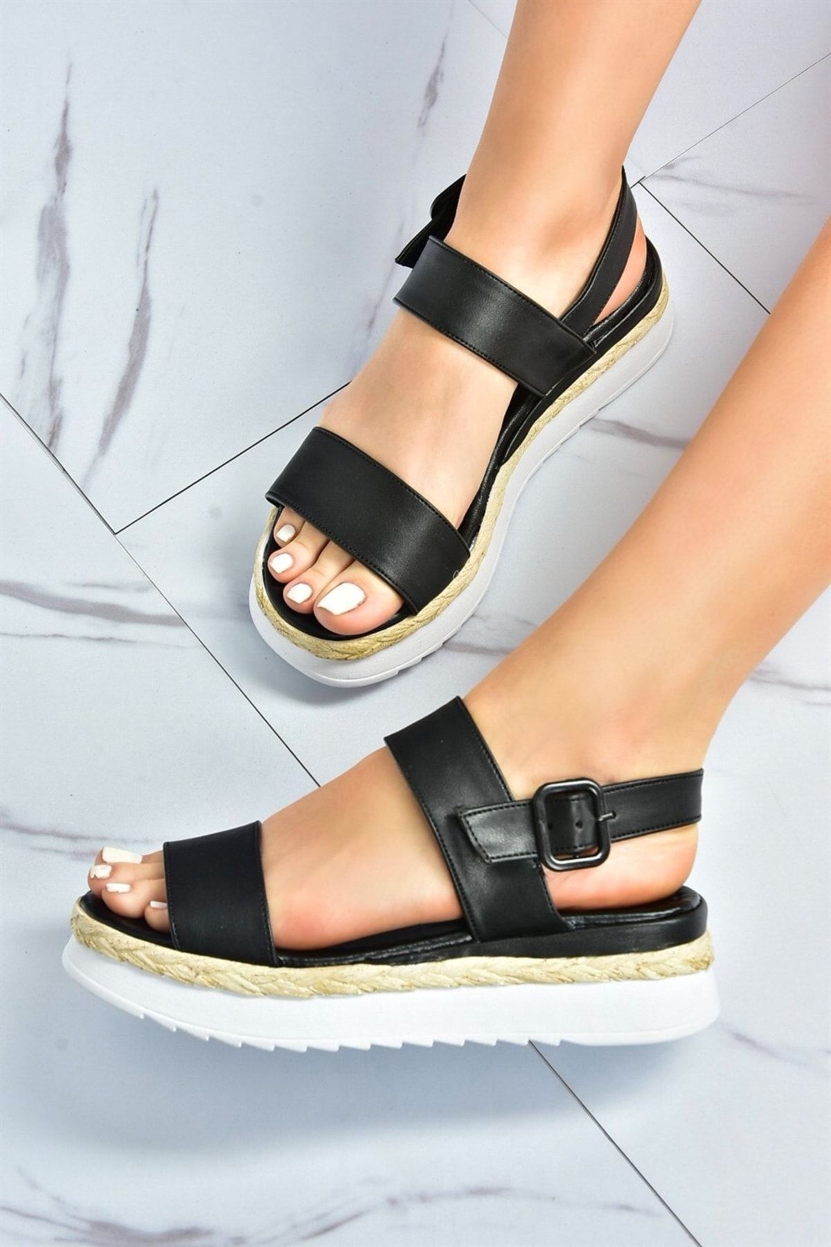 Black strap sandals sales with white sole