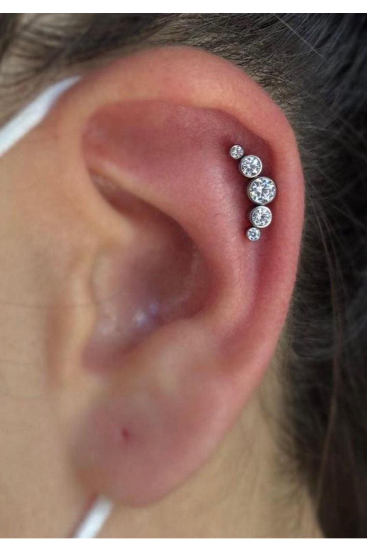 Conch and new arrivals cartilage piercing