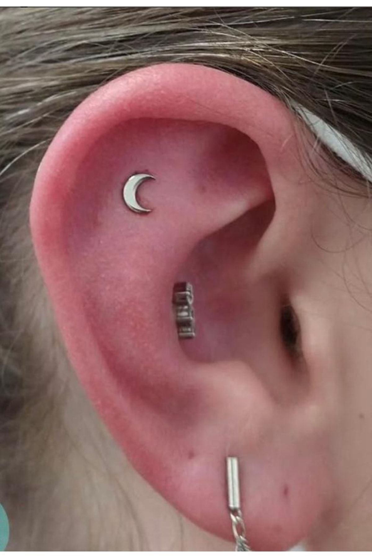 Conch and new arrivals cartilage piercing