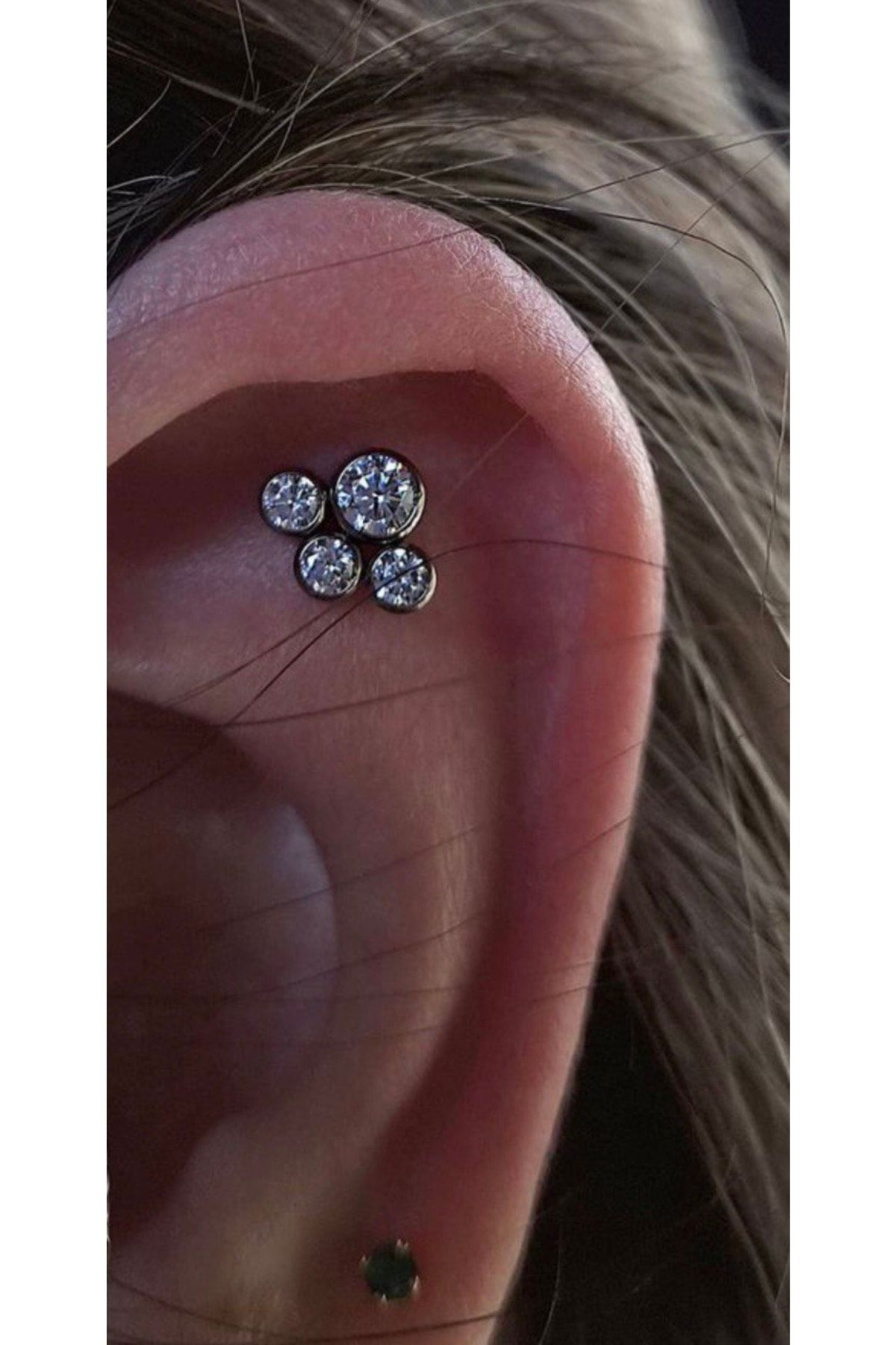 Flat store tragus piercing