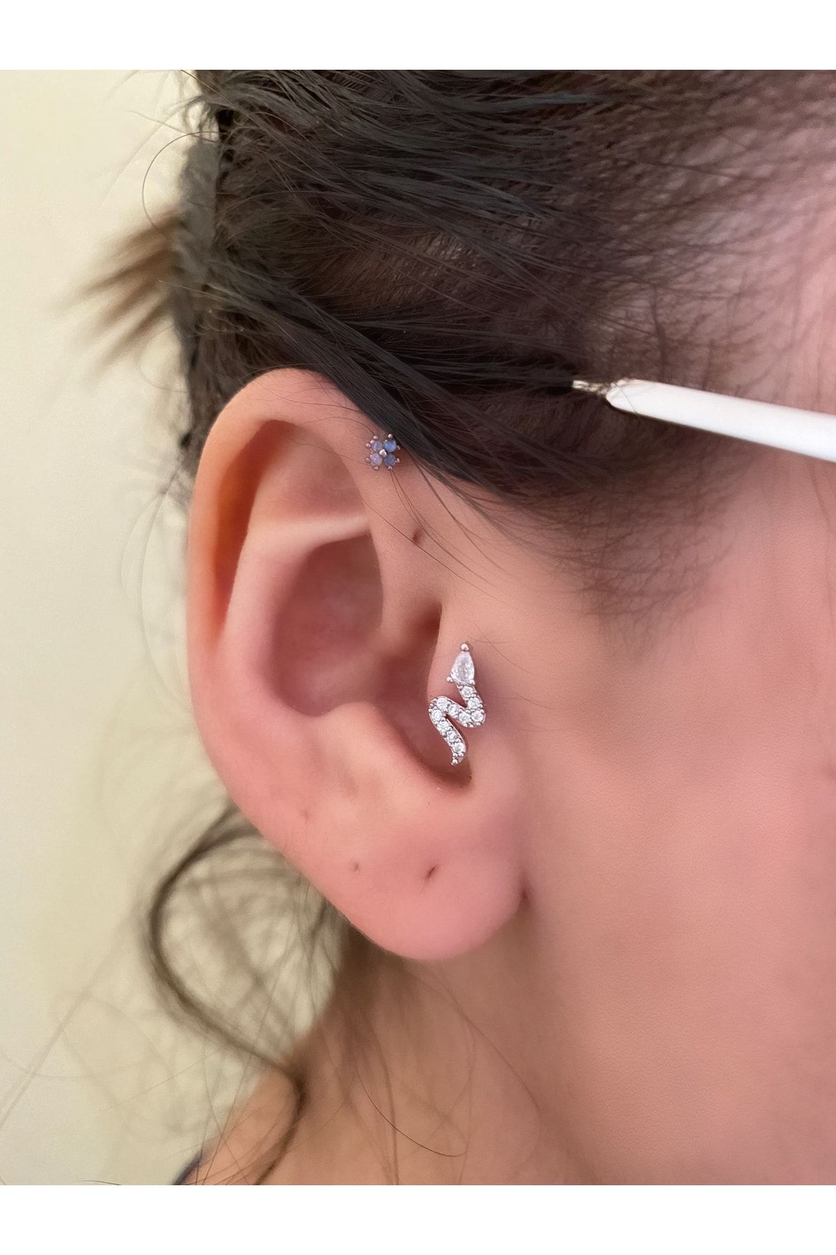Snake shop cartilage piercing