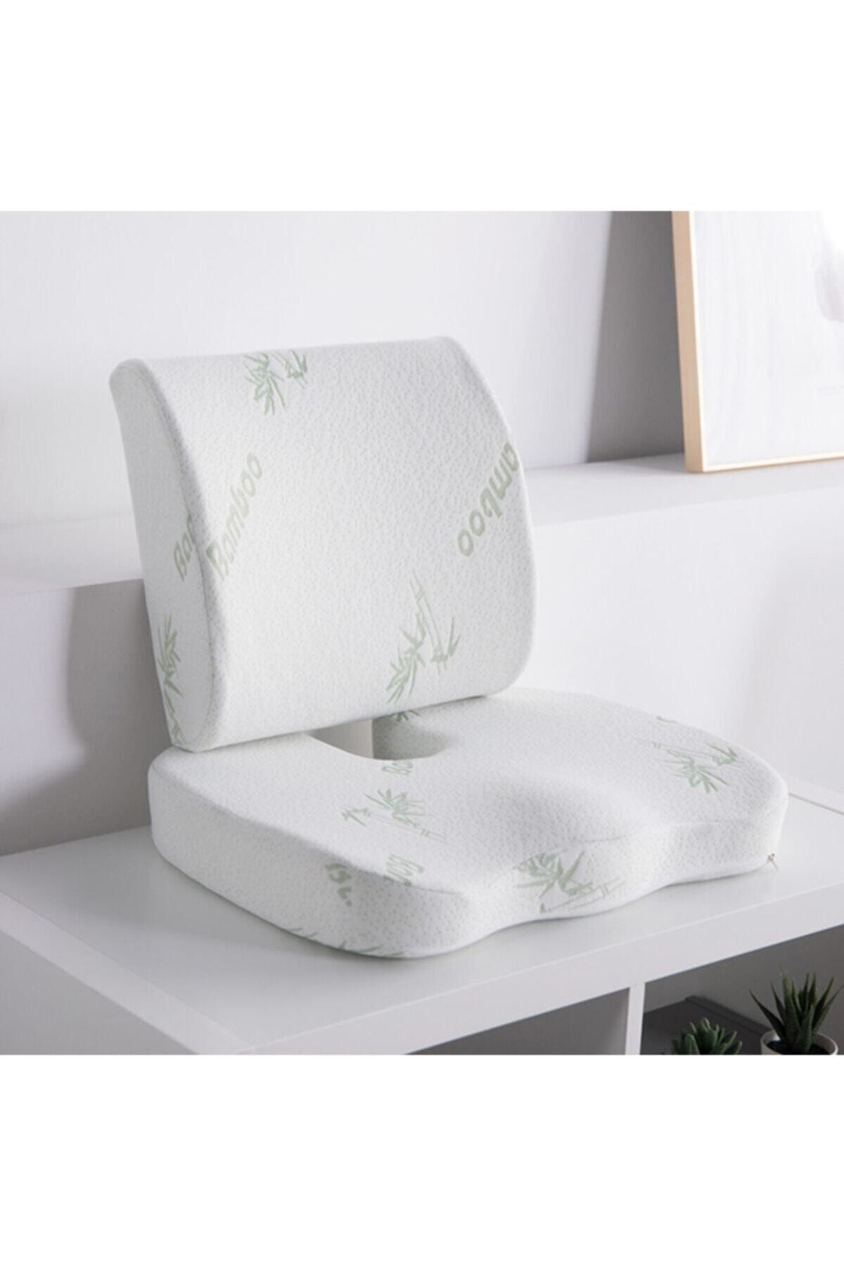 Pillow sitting top on bed