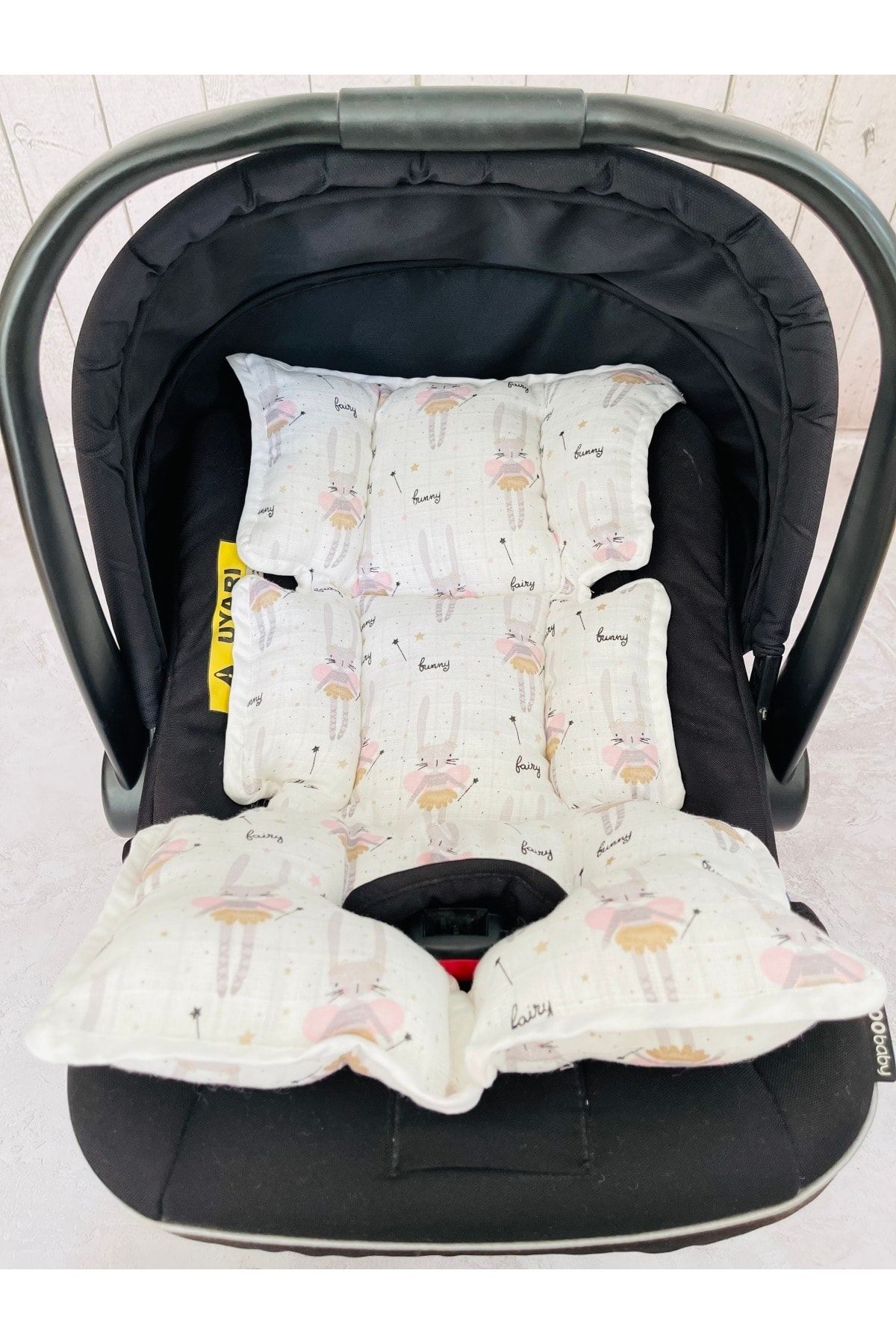 Car seat outlet carrier cushion