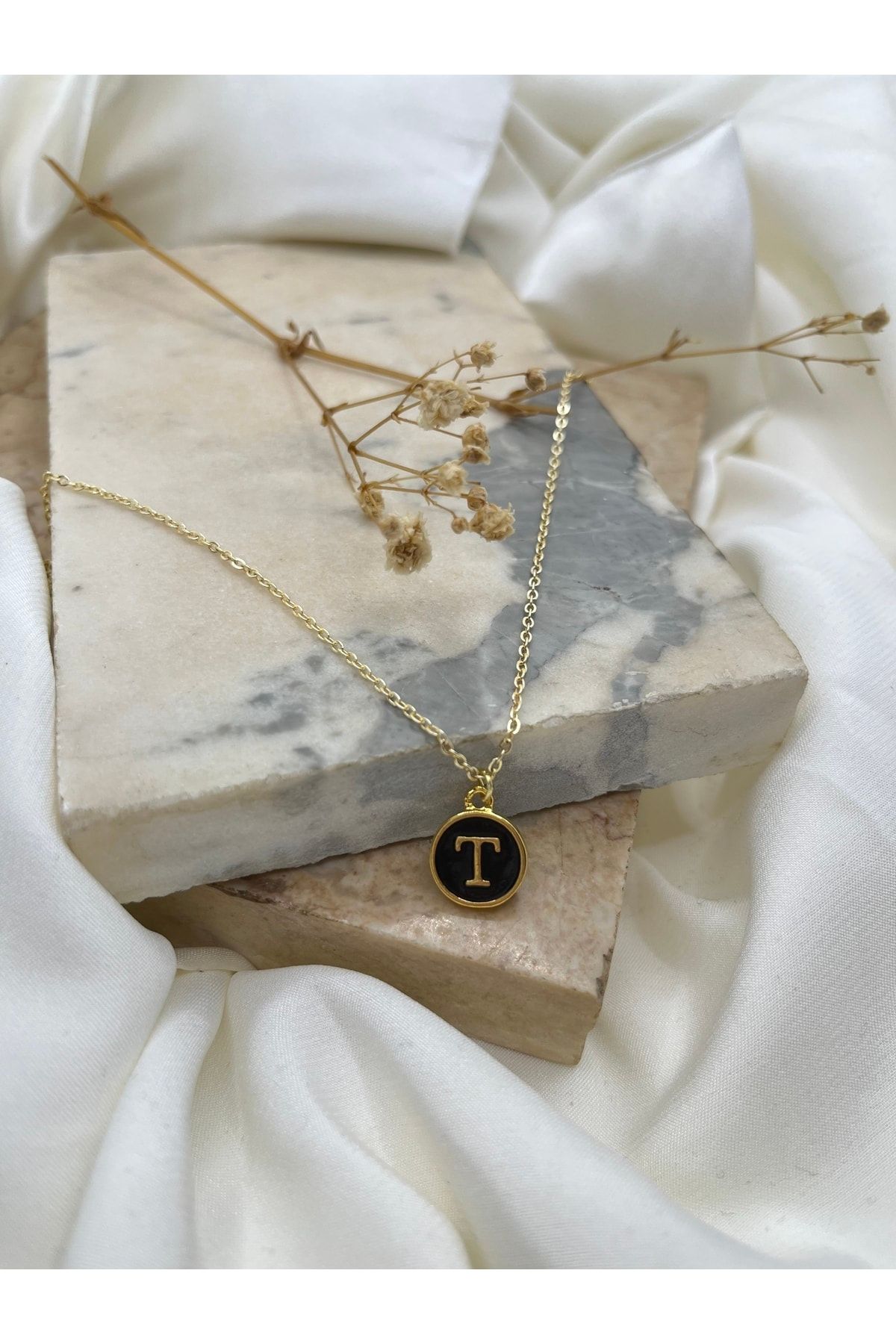 T pendant online