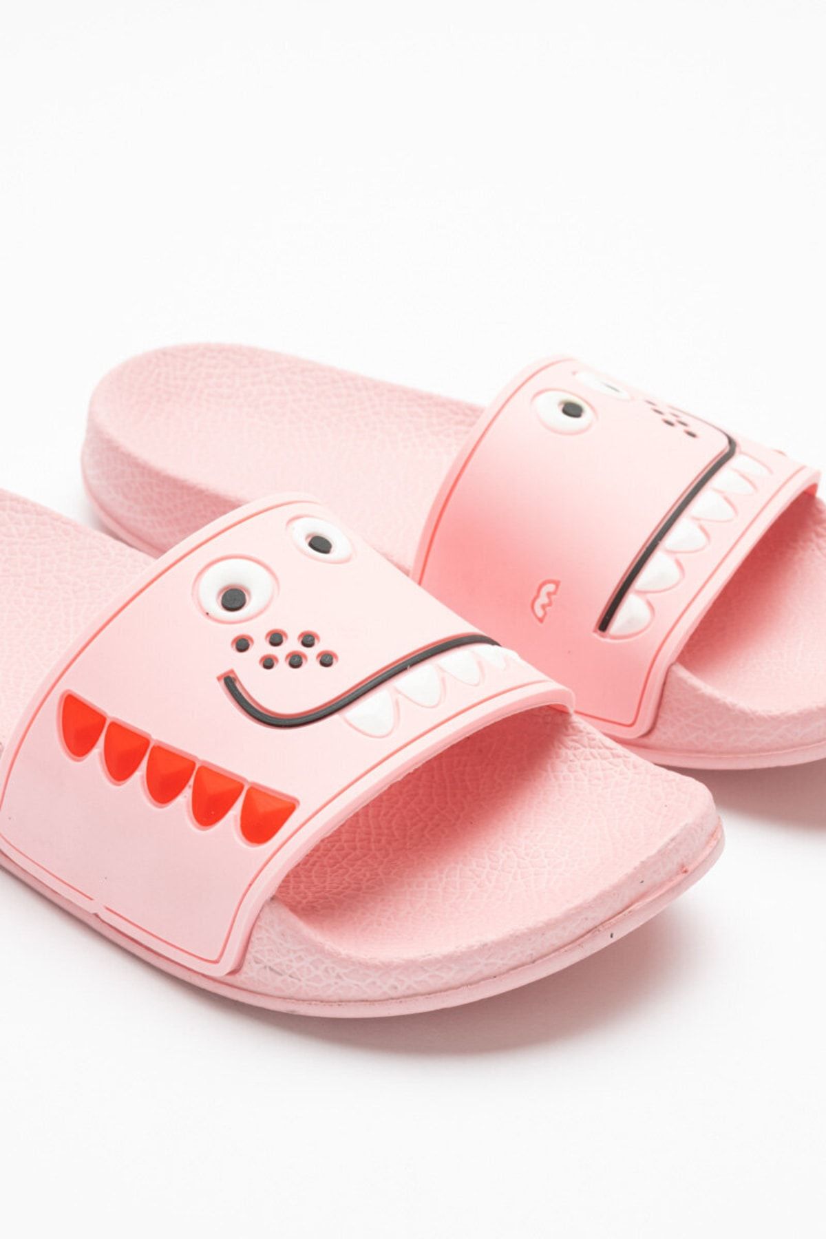 Pink dino slippers deals