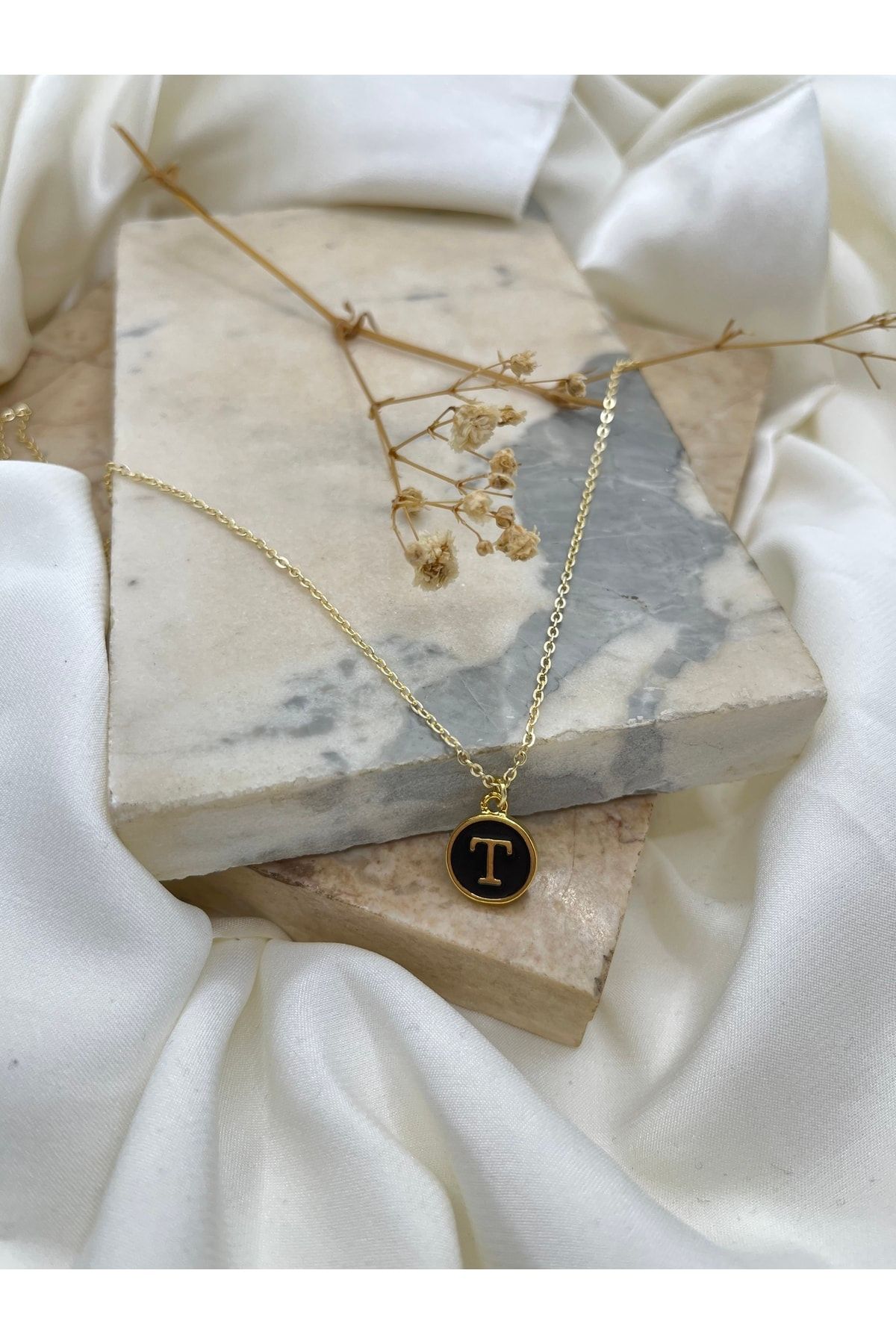 Claritas Tak Women s Gold Plated Black Enameled Round Letter T