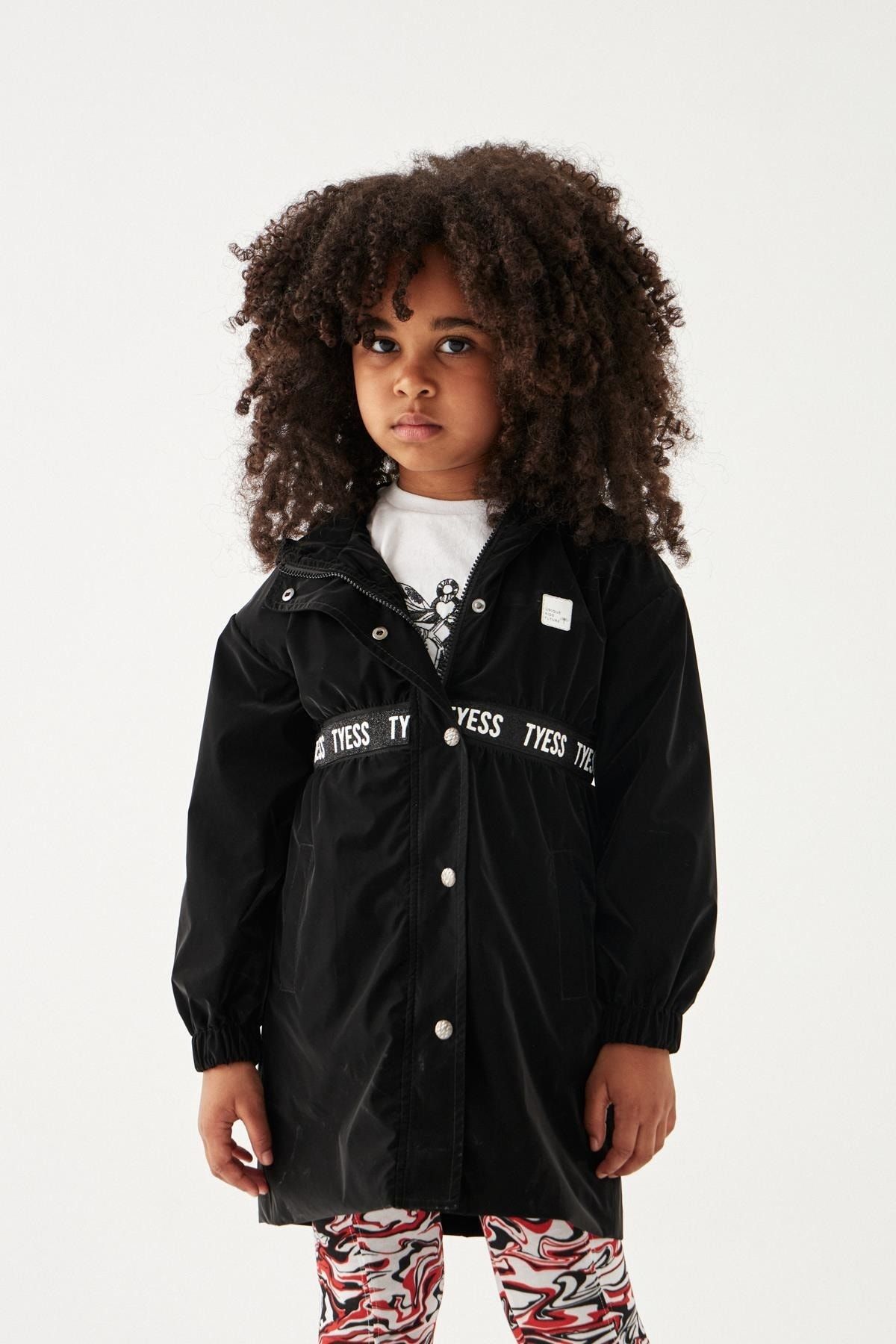 Girls black raincoat top