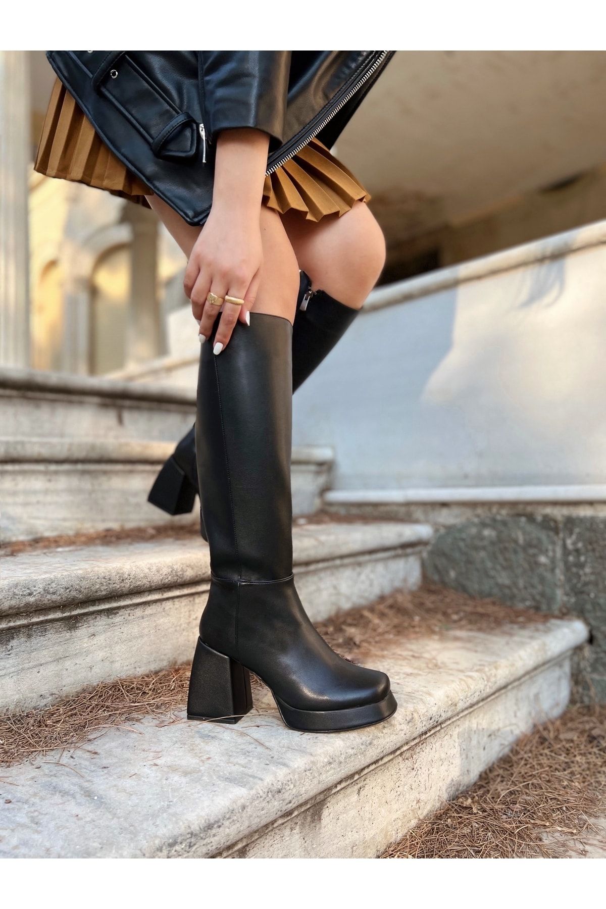 Black knee high boots in clearance store