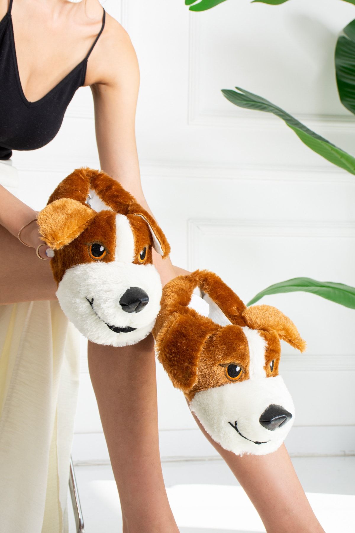Dog wearing slippers sales