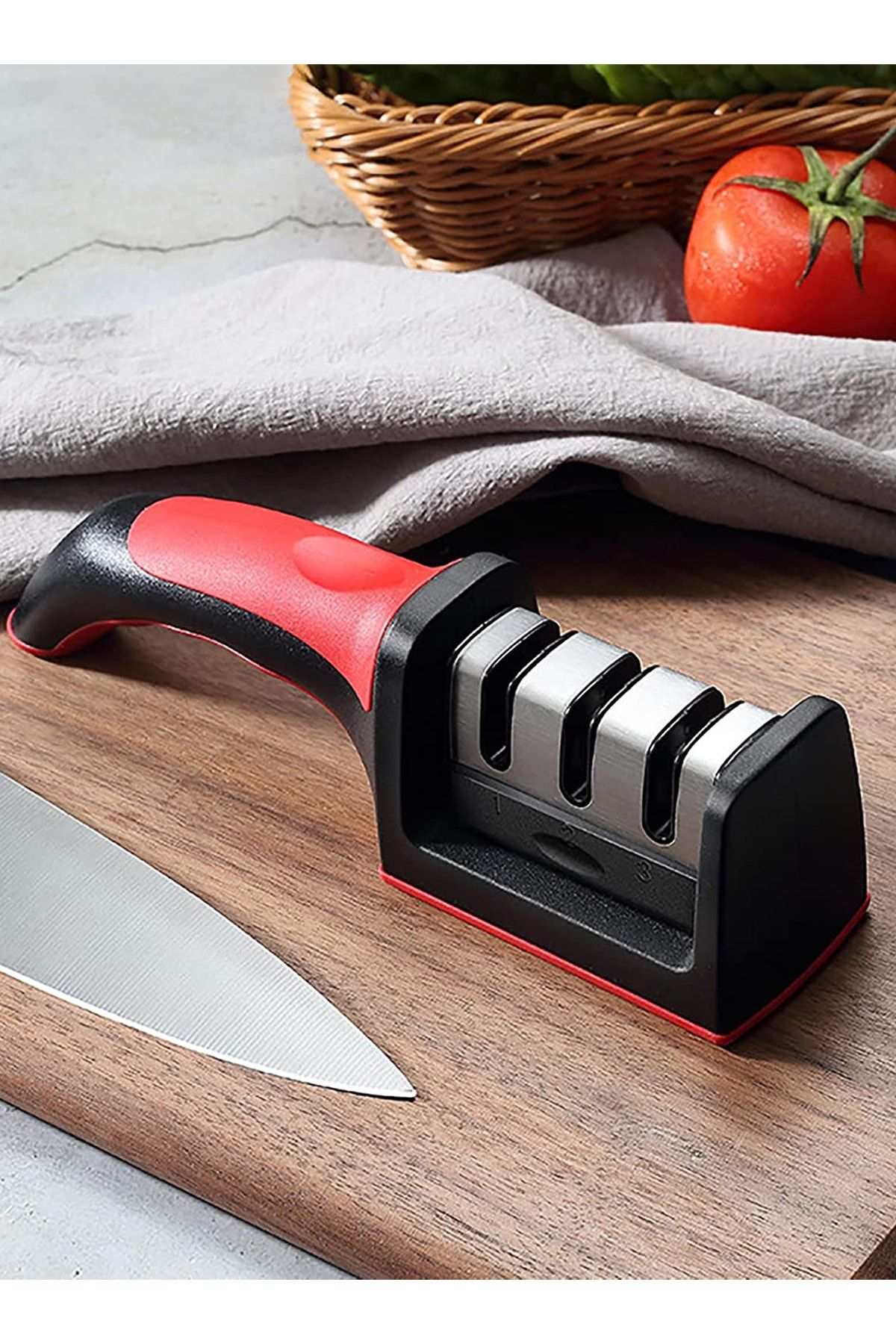 Hand deals knife sharpener