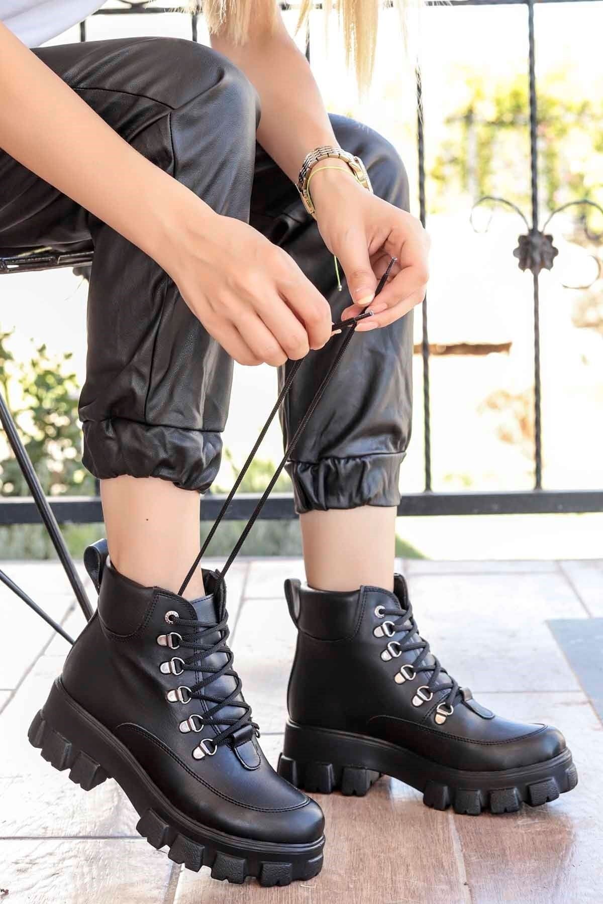 Black wedge combat boots deals