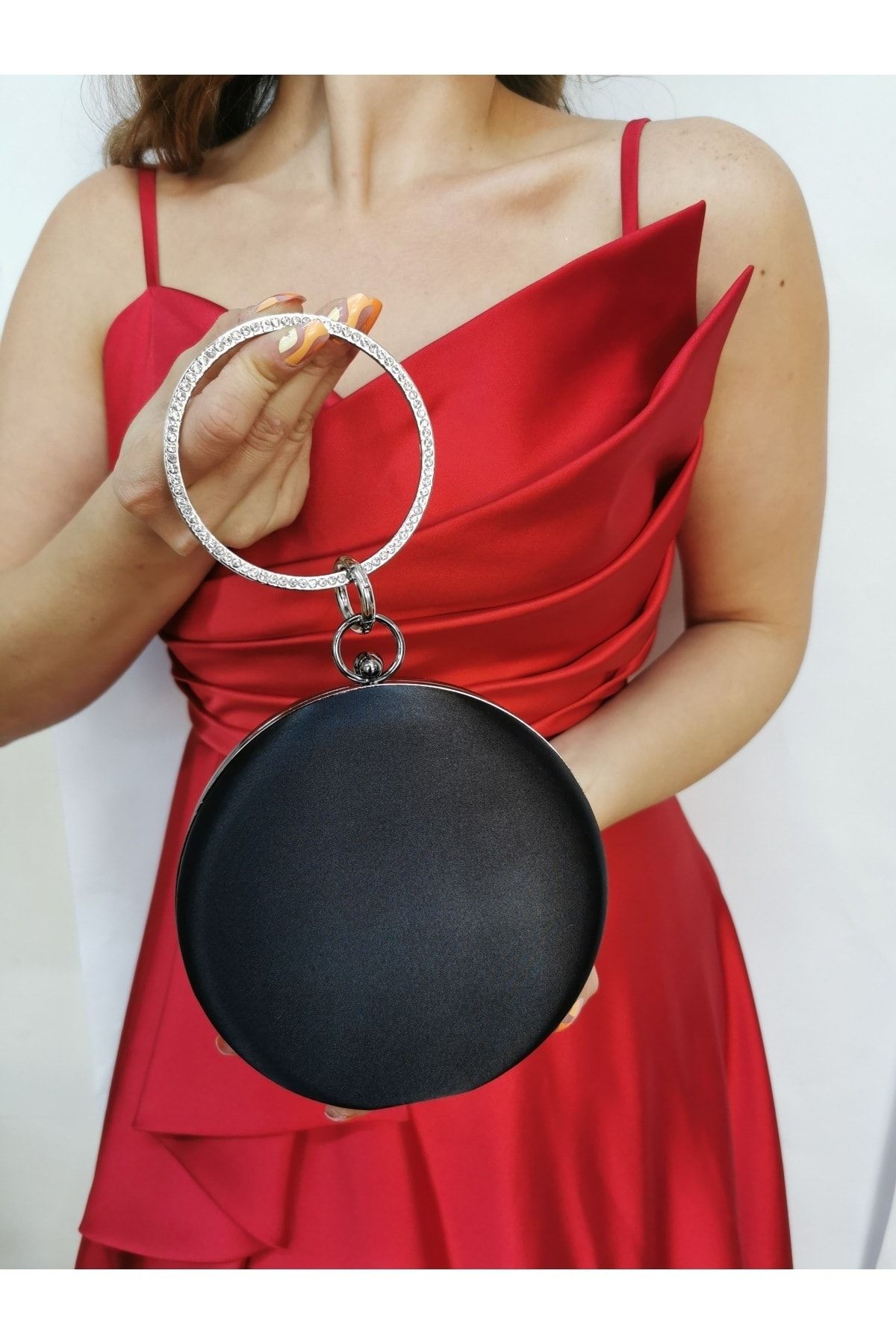 Round black clutch bag store