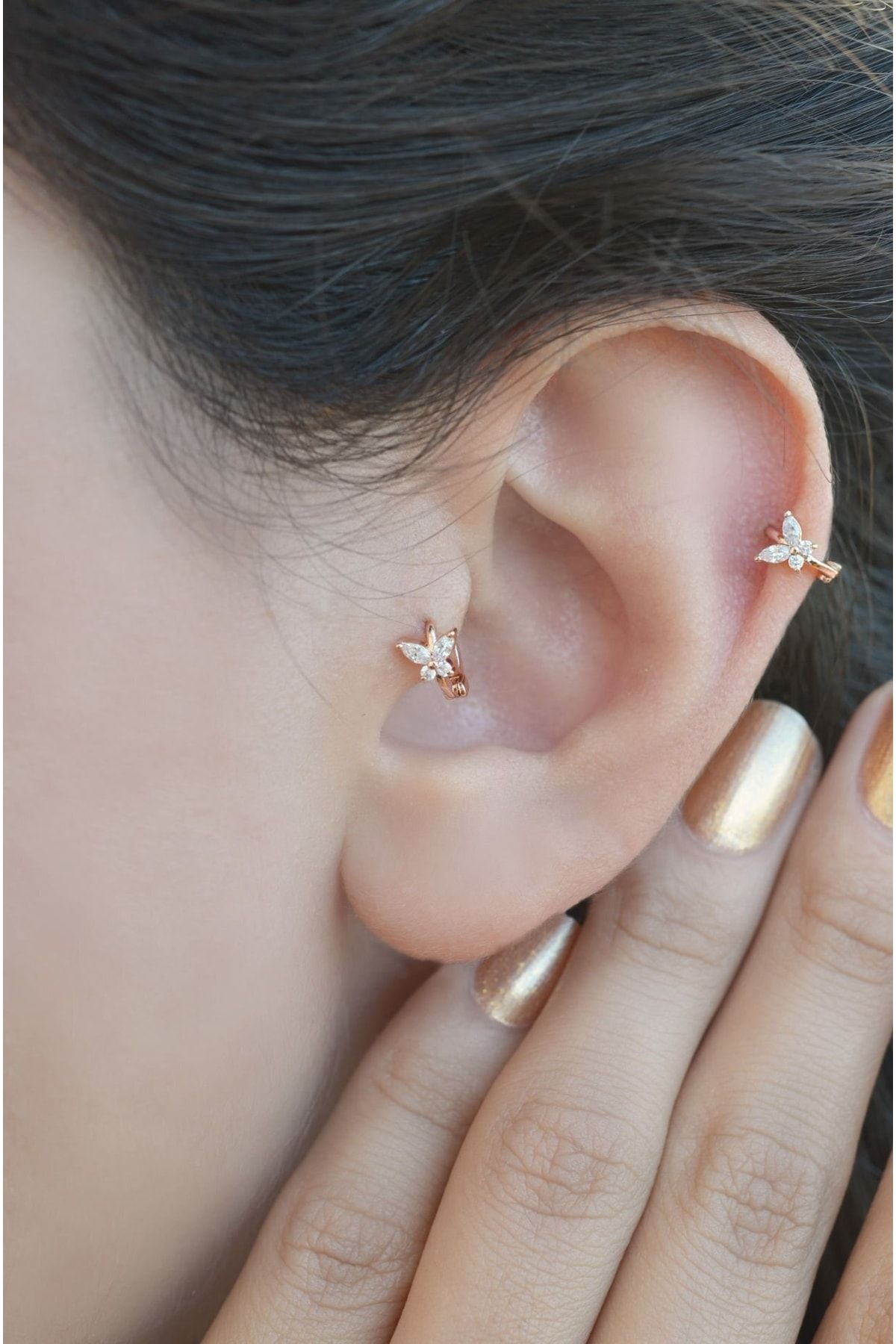 Butterfly outlet tragus piercing