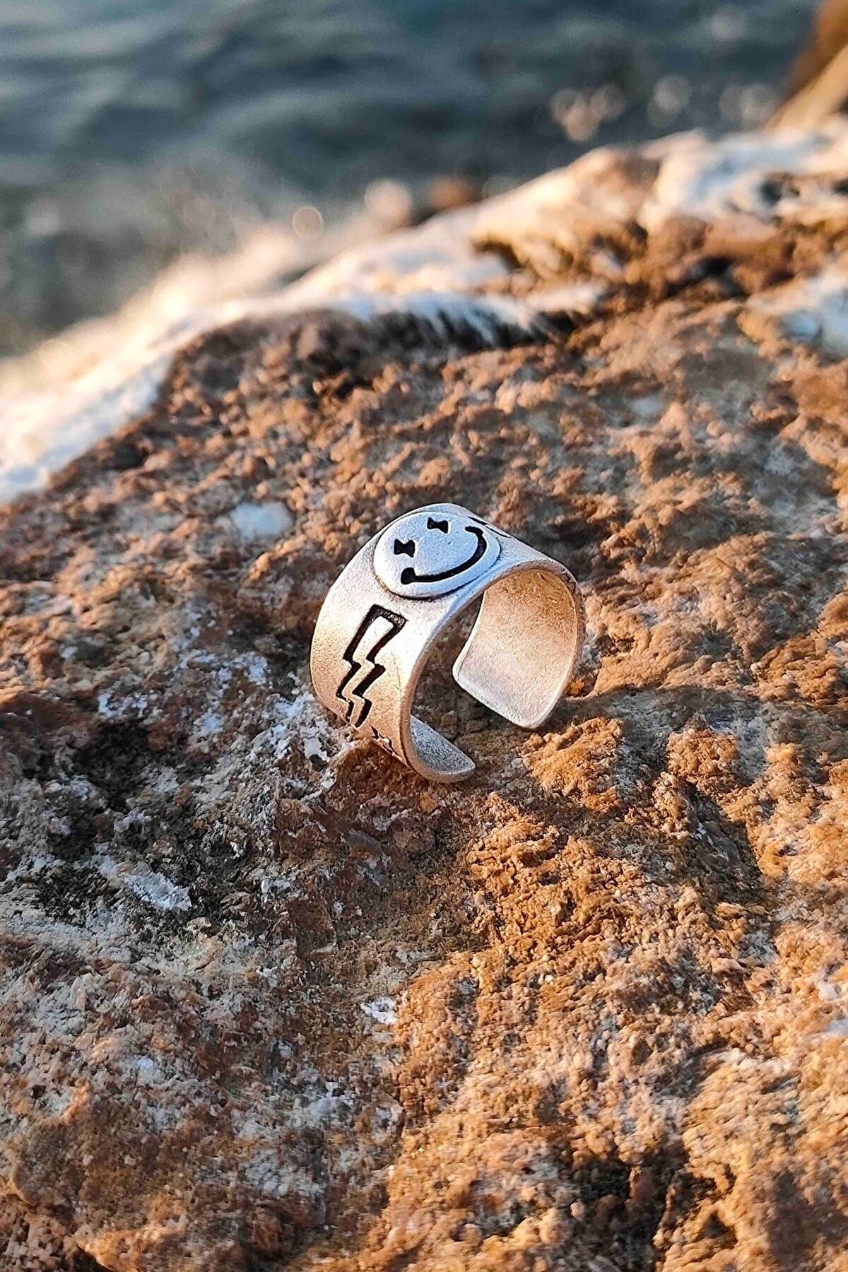 Smiley face ring 2025 with lightning bolt