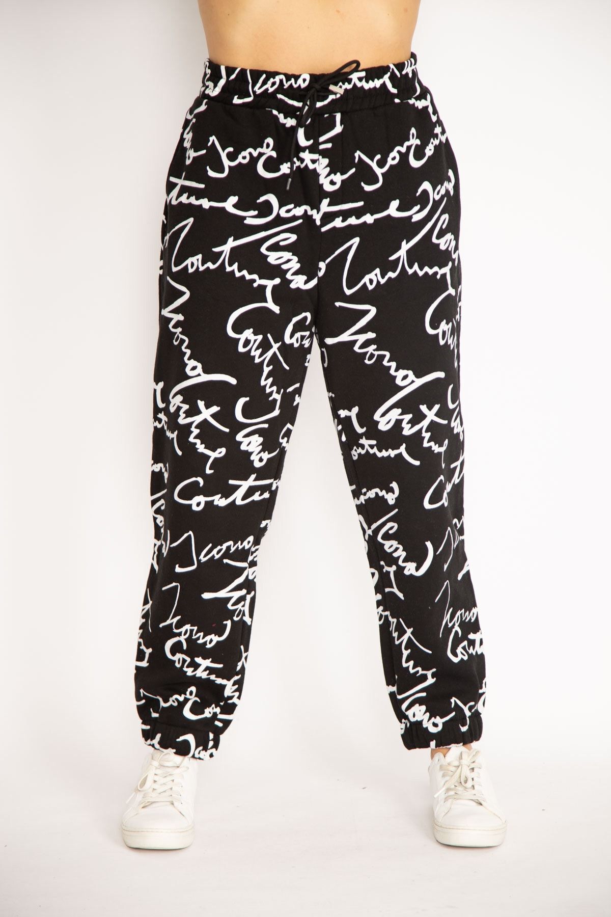 Black and rose gold tracksuit 2025