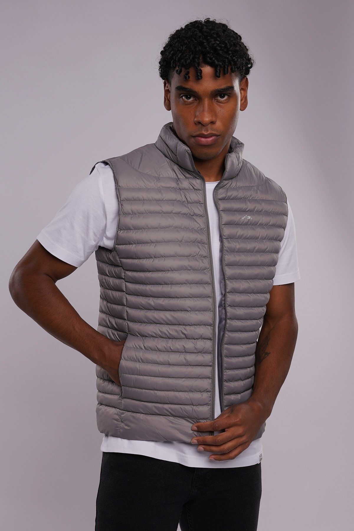 Puffer vest sales with sweater sleeves