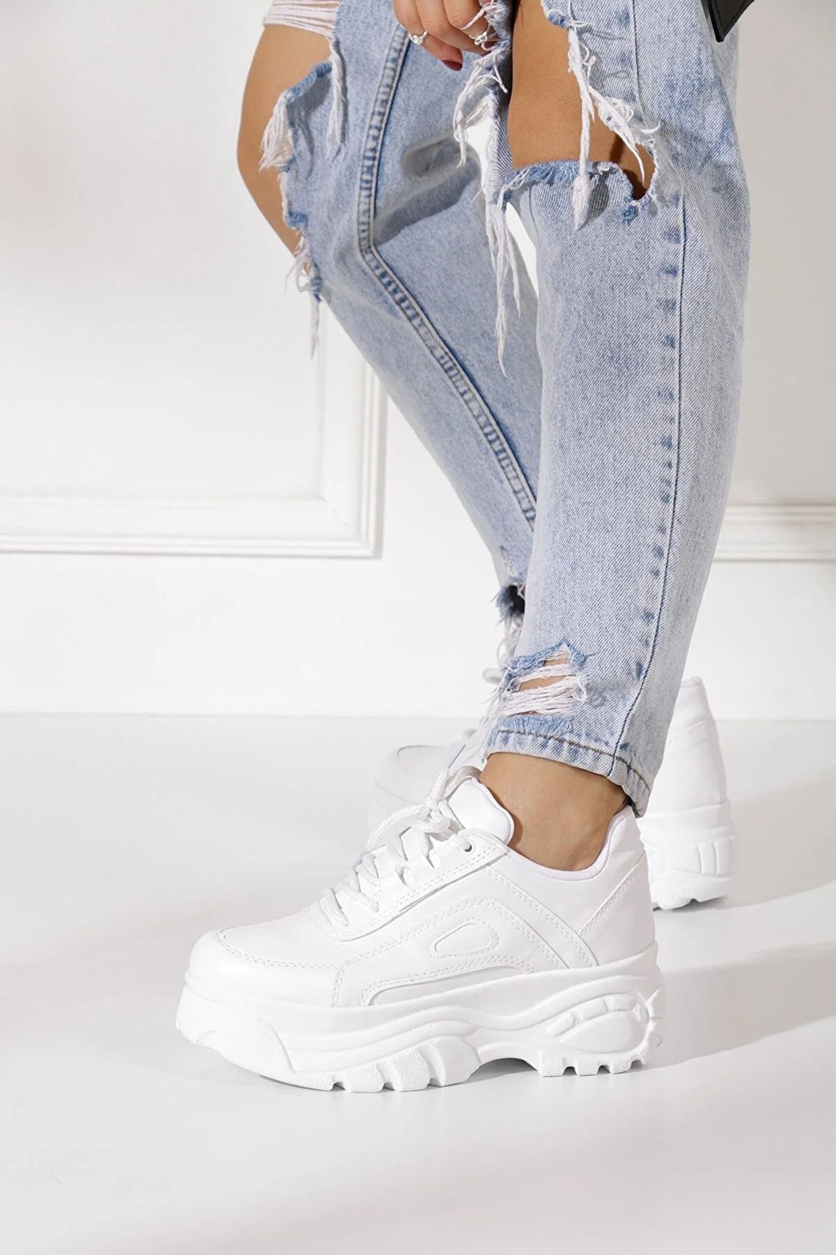 Trendy white platform sneakers store