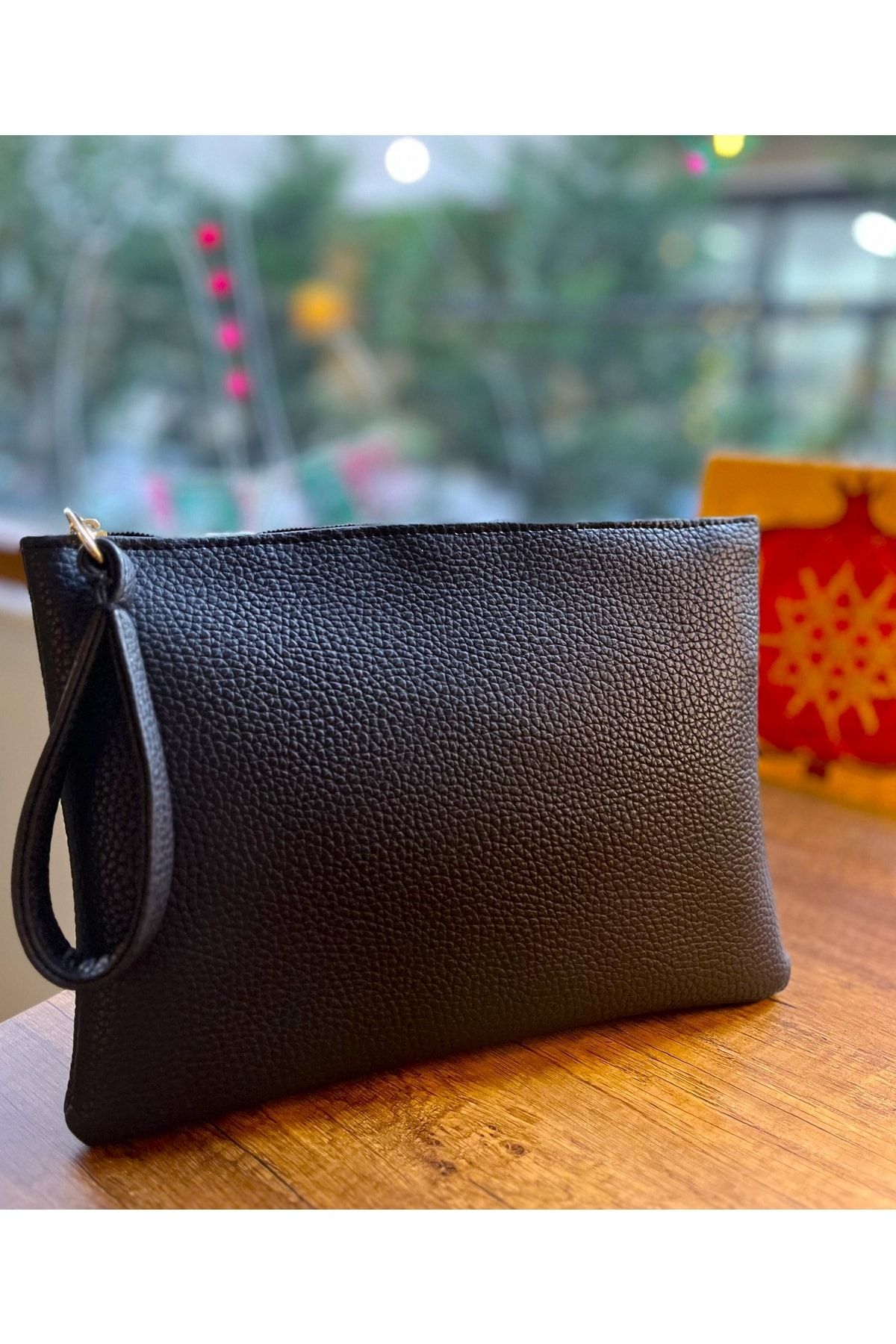 Portfolio clutch shop