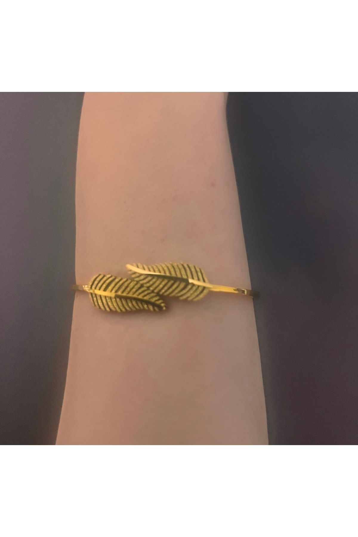 Gold feather shop bracelet