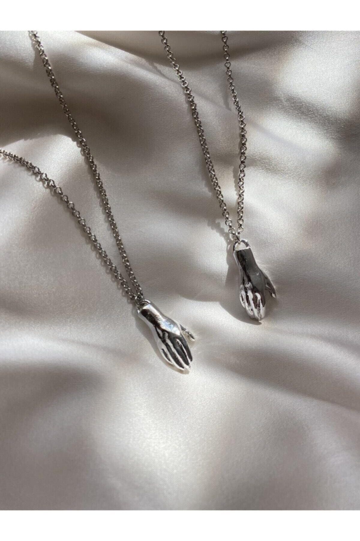 Holding hands hot sale necklace