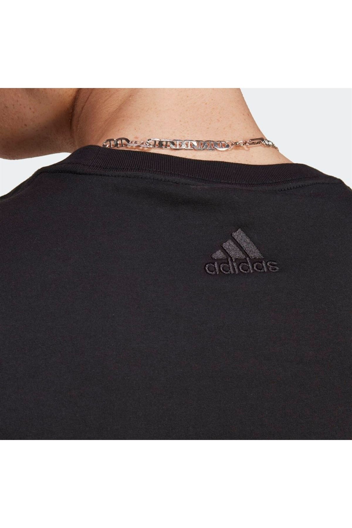 Adidas t shirt top logo in middle