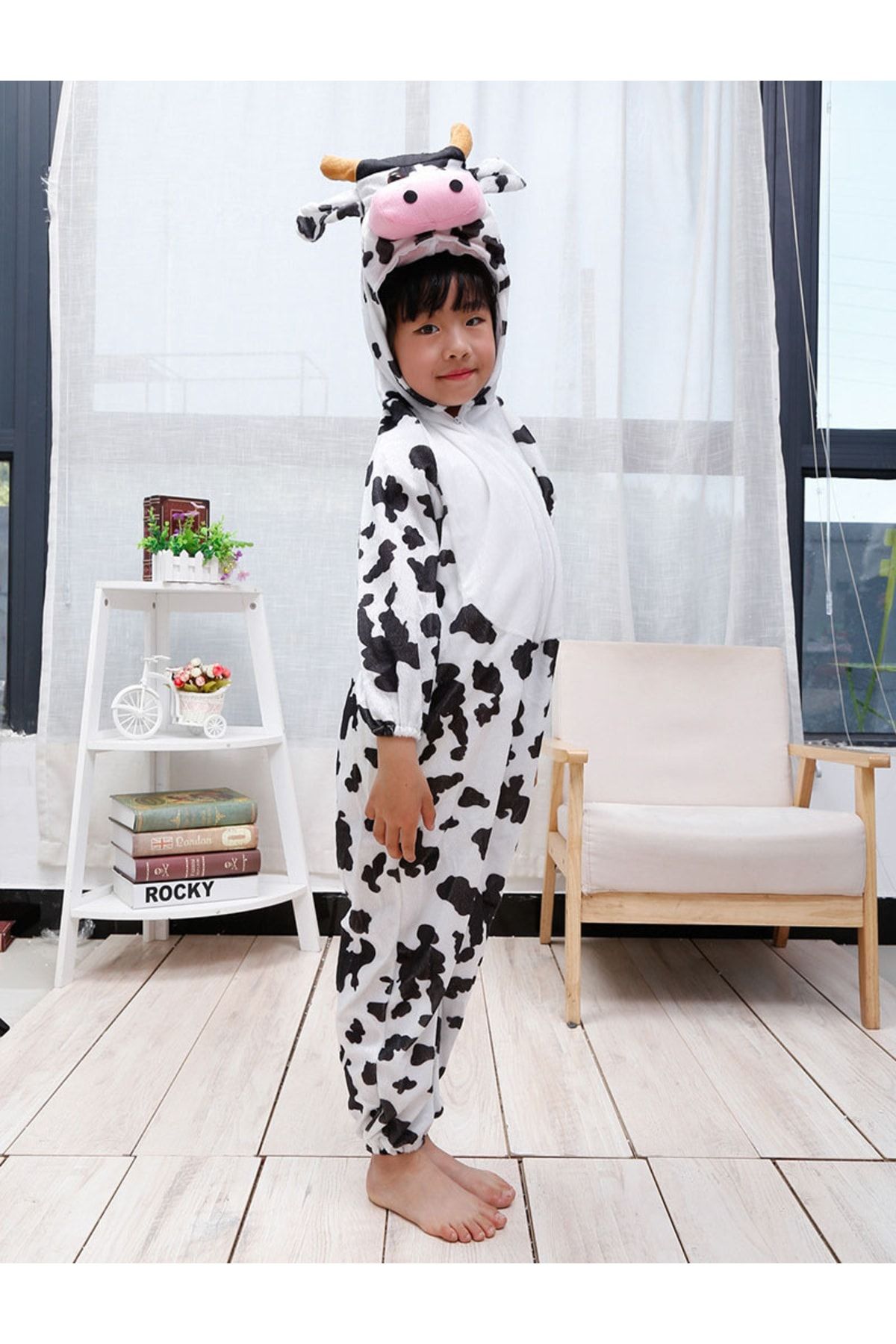 Baby girl deals cow costume
